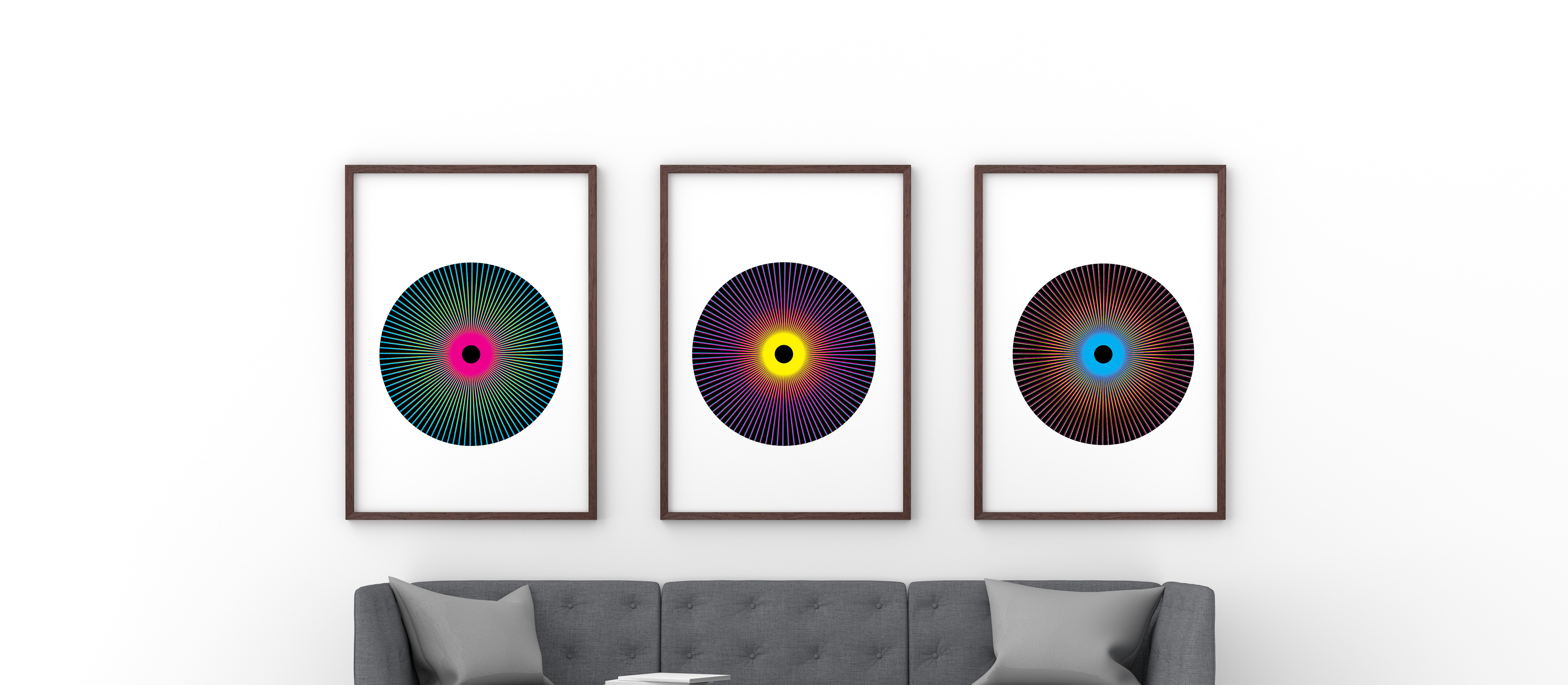 Penumbra (triptych) prints on wall in living room setting.