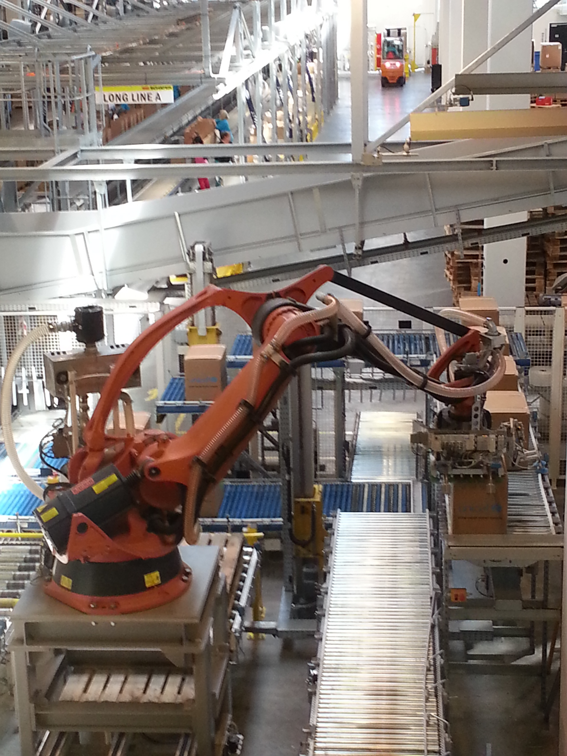 Automated assembly lines pack resources for global distribution.