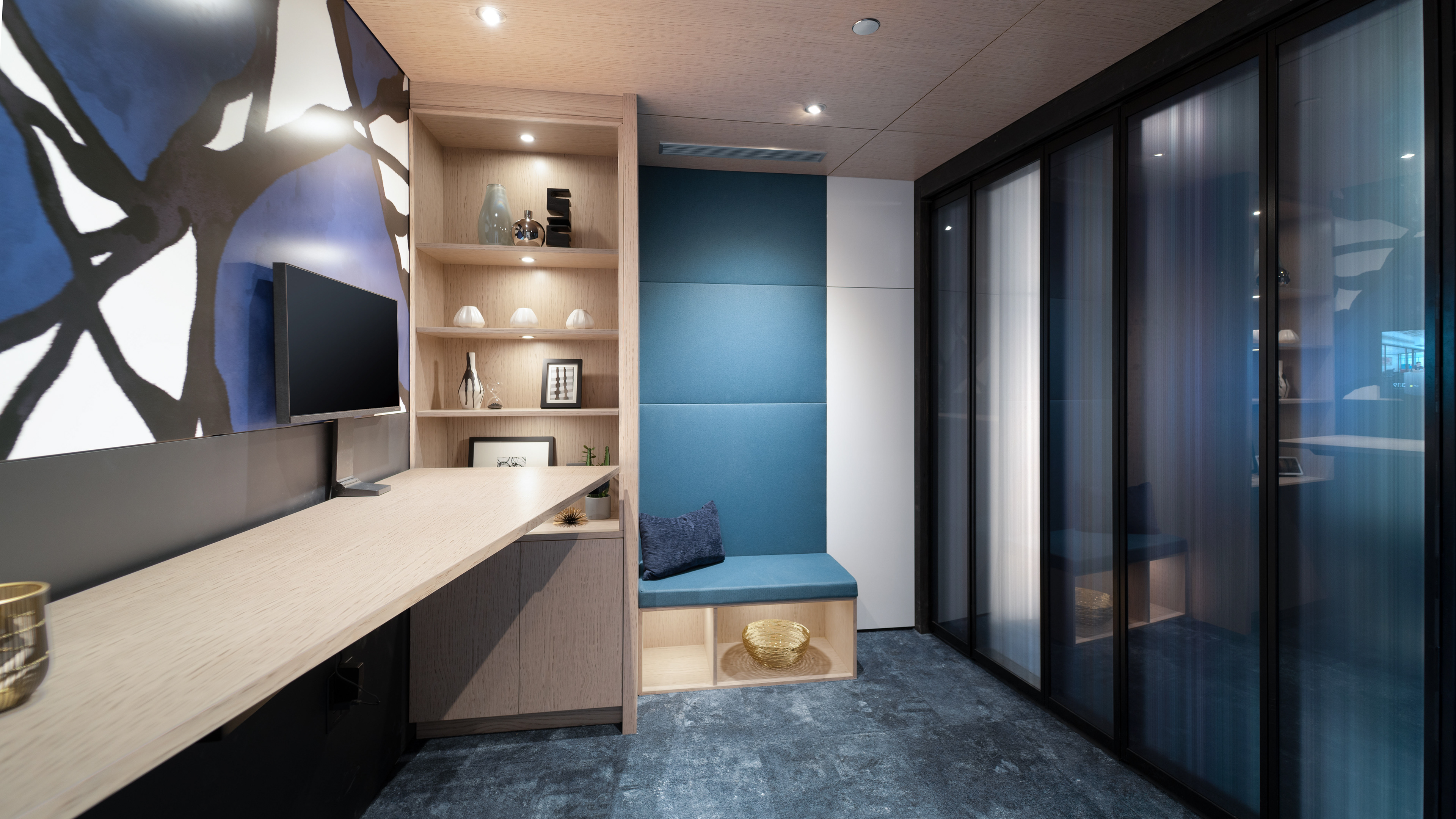 Abstract graphic made for the private office. The foldable wall to the right was made with stretched stroked in the meeting room's colours.