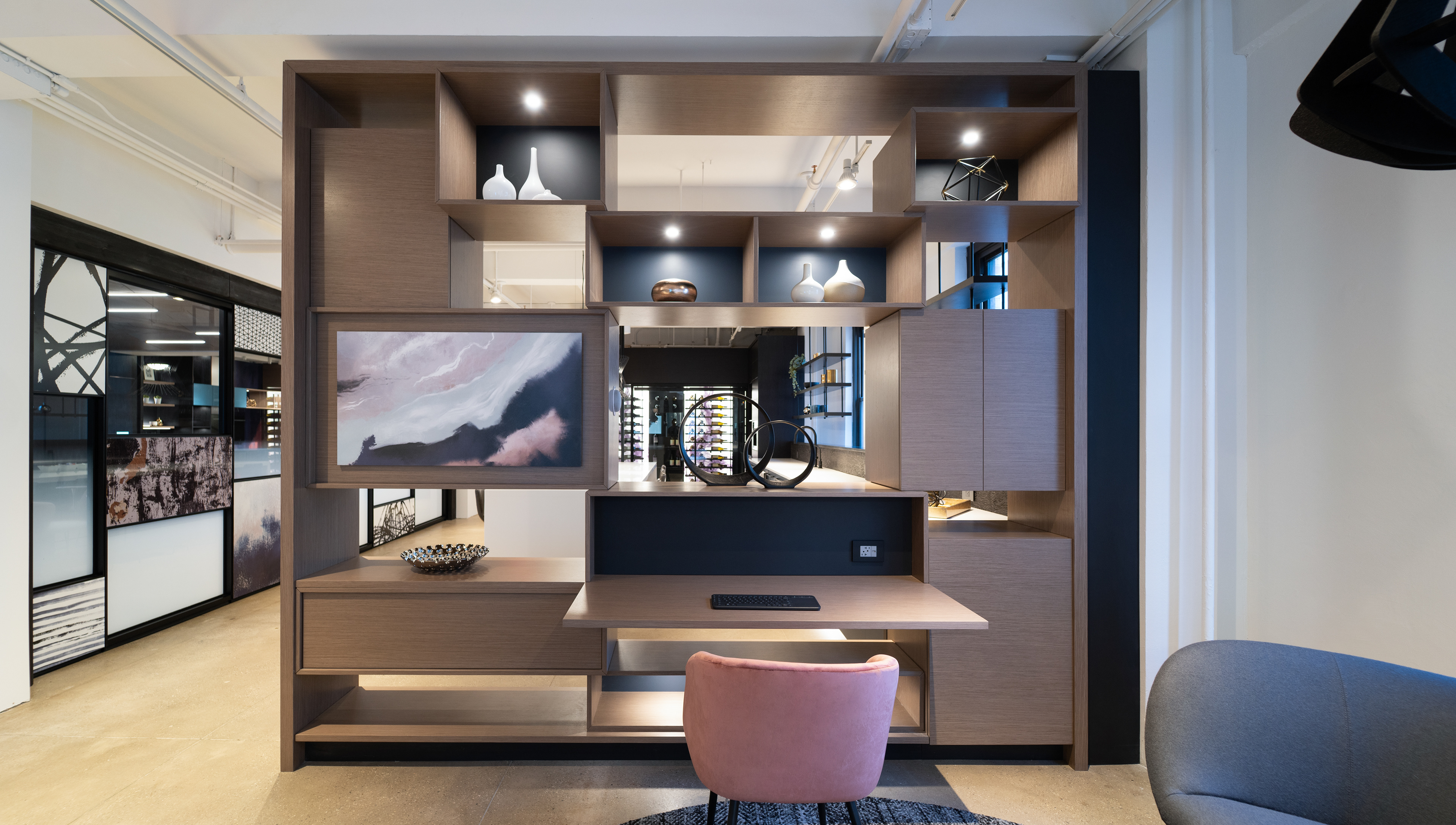 Waiting area in-between the kitchen and the healthcare space. Artwork was made to be abstract and calming.