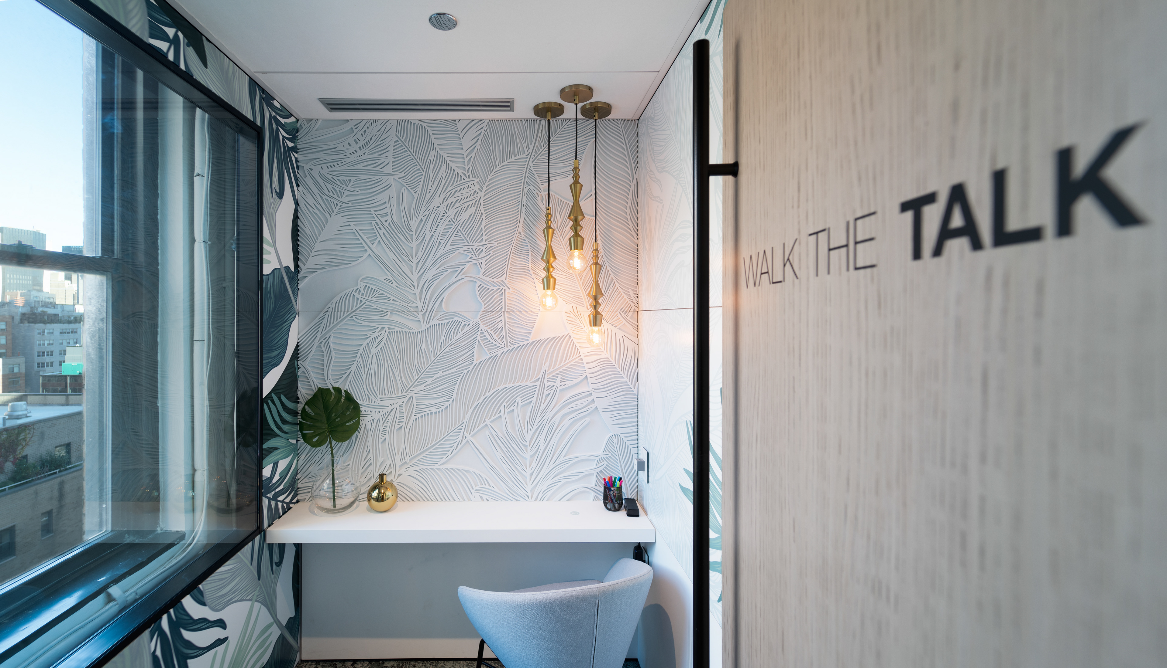 Walls are done in a writeable film, the right is filled with just the outlines to colour in, and the rest of the room is printed in full colour. The panel in the centre is laser cut felt that flows seamlessly from both edges of the adjacent wall tiles. All are hand drawn and placed in as a seamless pattern.