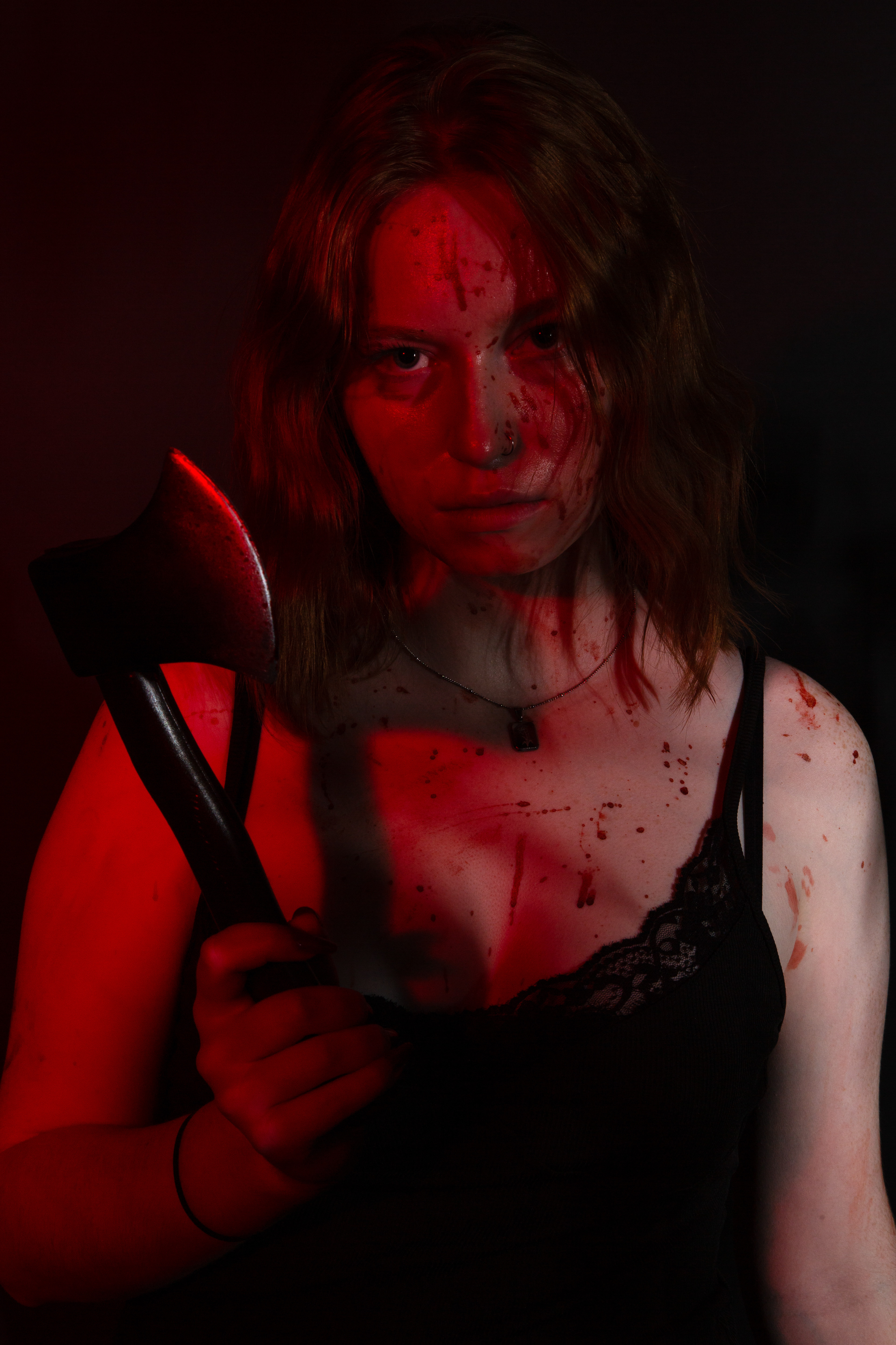 This was an in-class assignment with the theme Halloween. I assisted in lighting and also modeled in the shoot. The idea we had in mind for the Halloween theme was slasher movie.