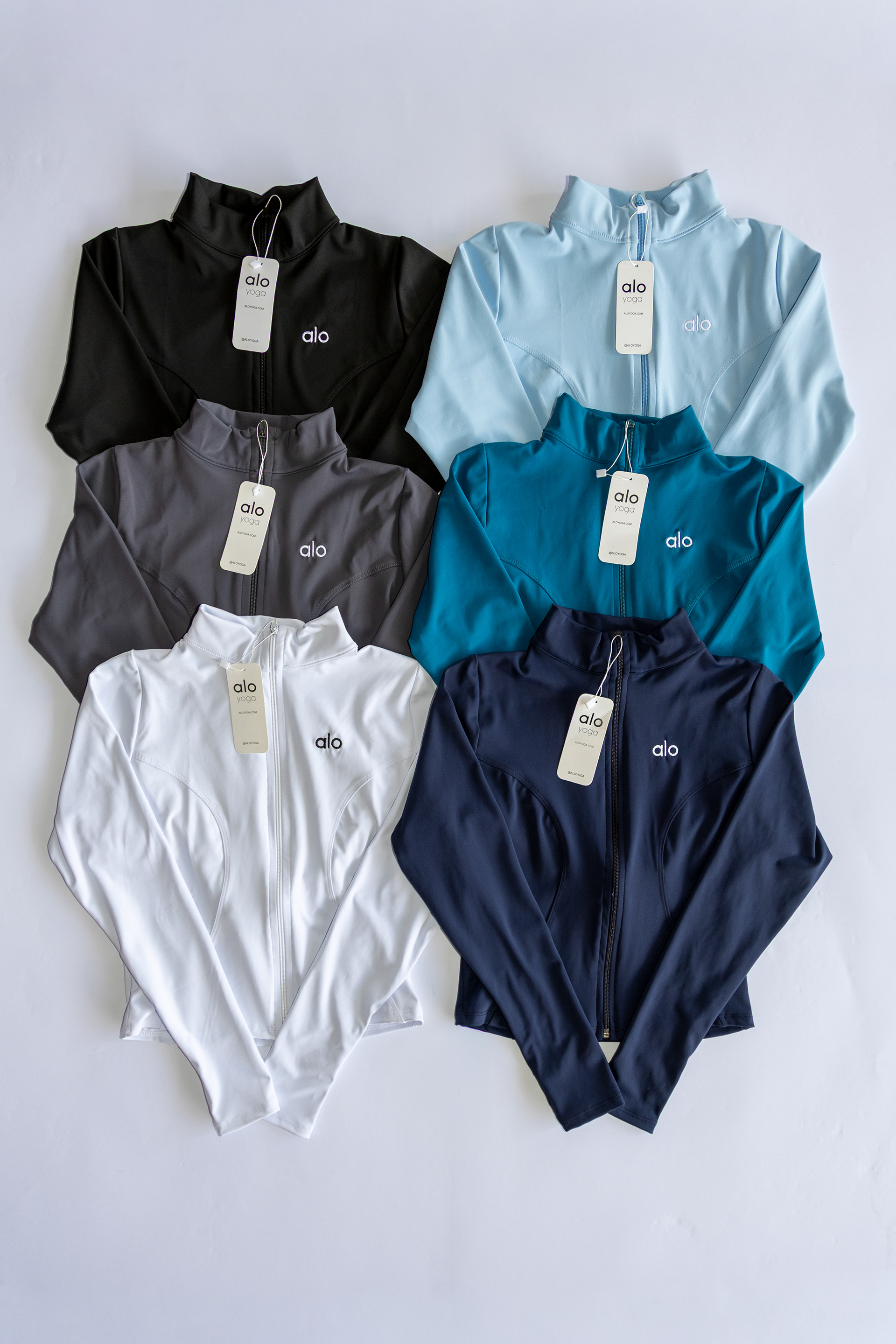 CHAMARRA - UNI / $185 - licra polex yoga, logos bordados