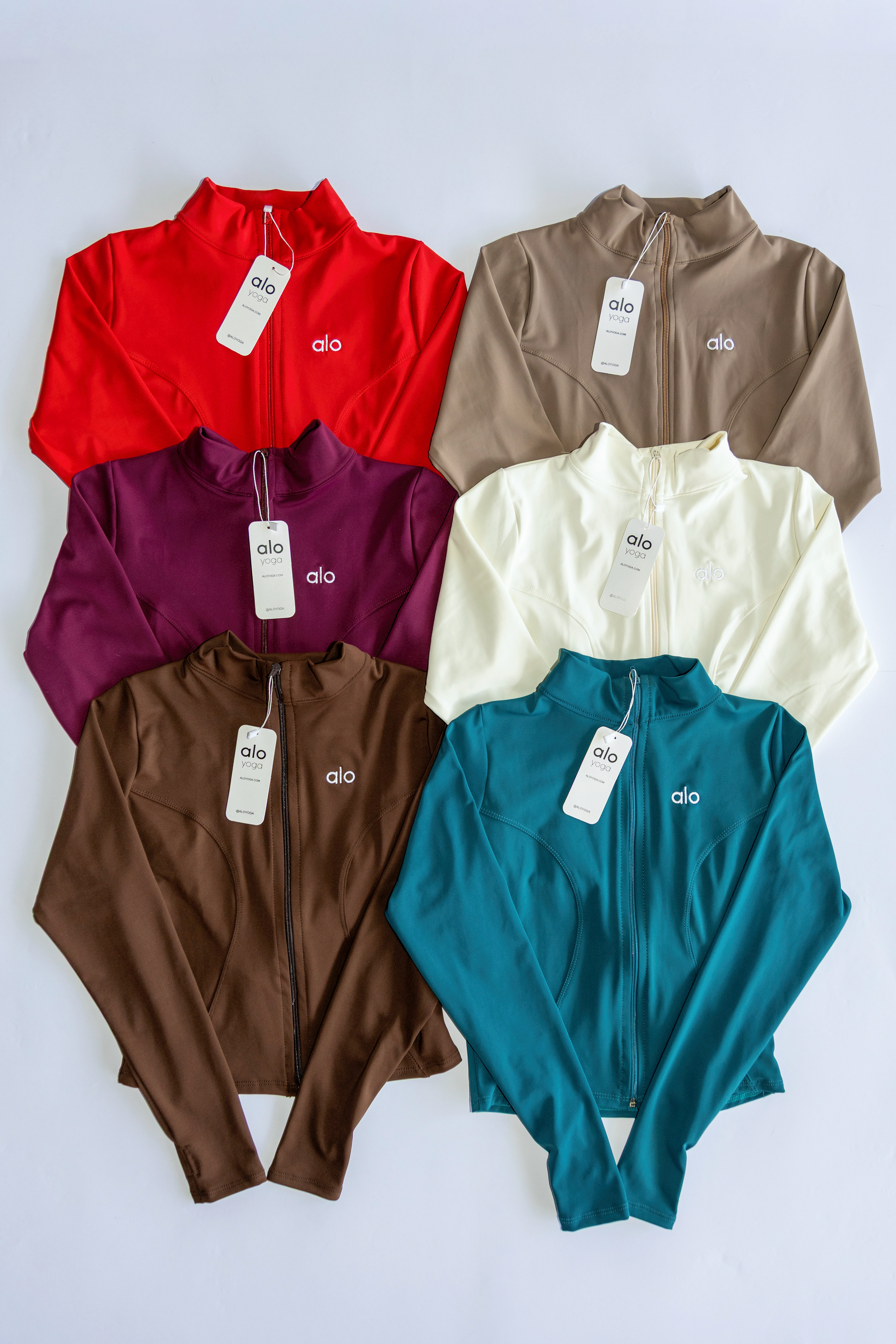 CHAMARRA - UNI / $185 - licra polex yoga, logos bordados