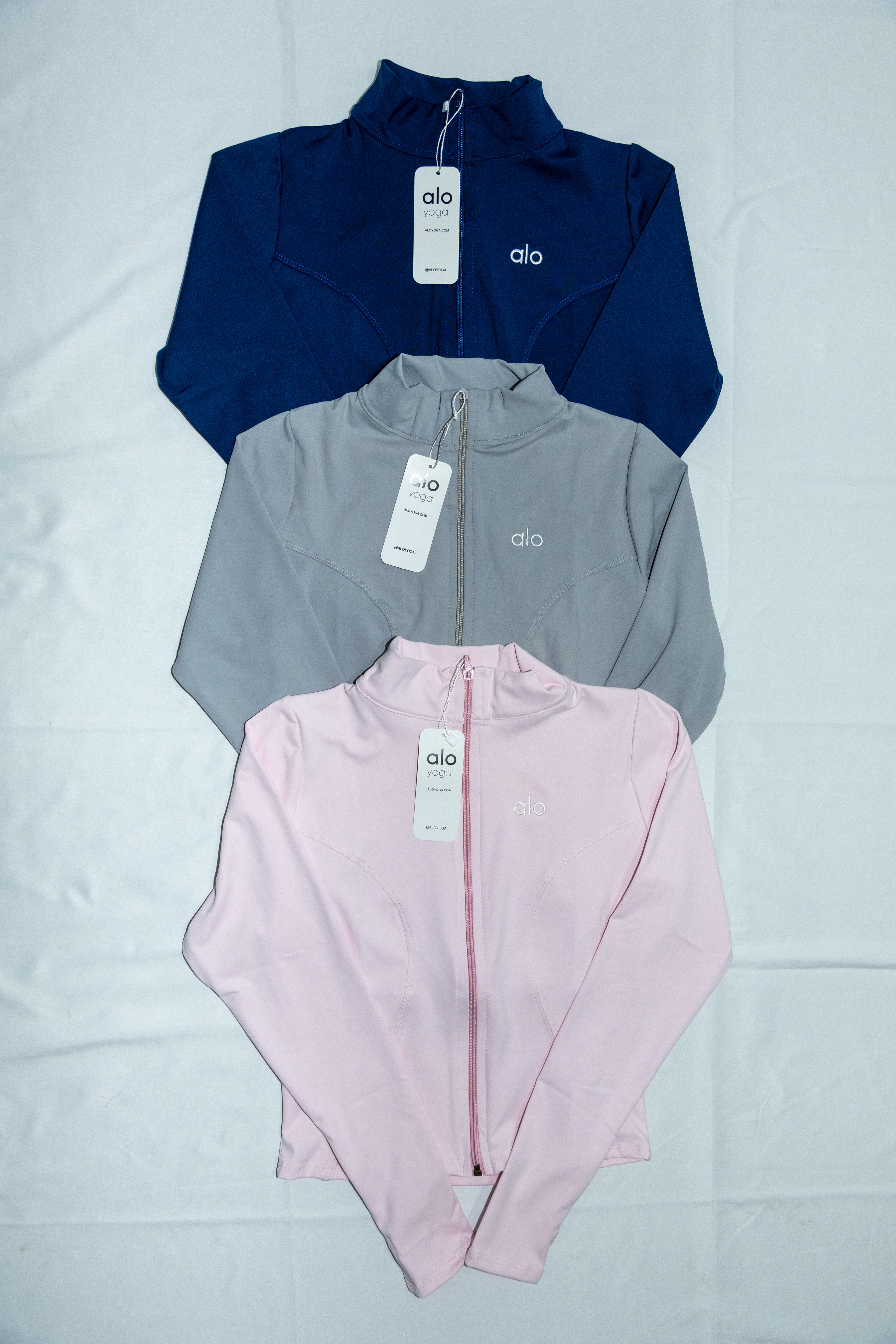 CHAMARRA - UNI / $185 - licra polex yoga, logos bordados