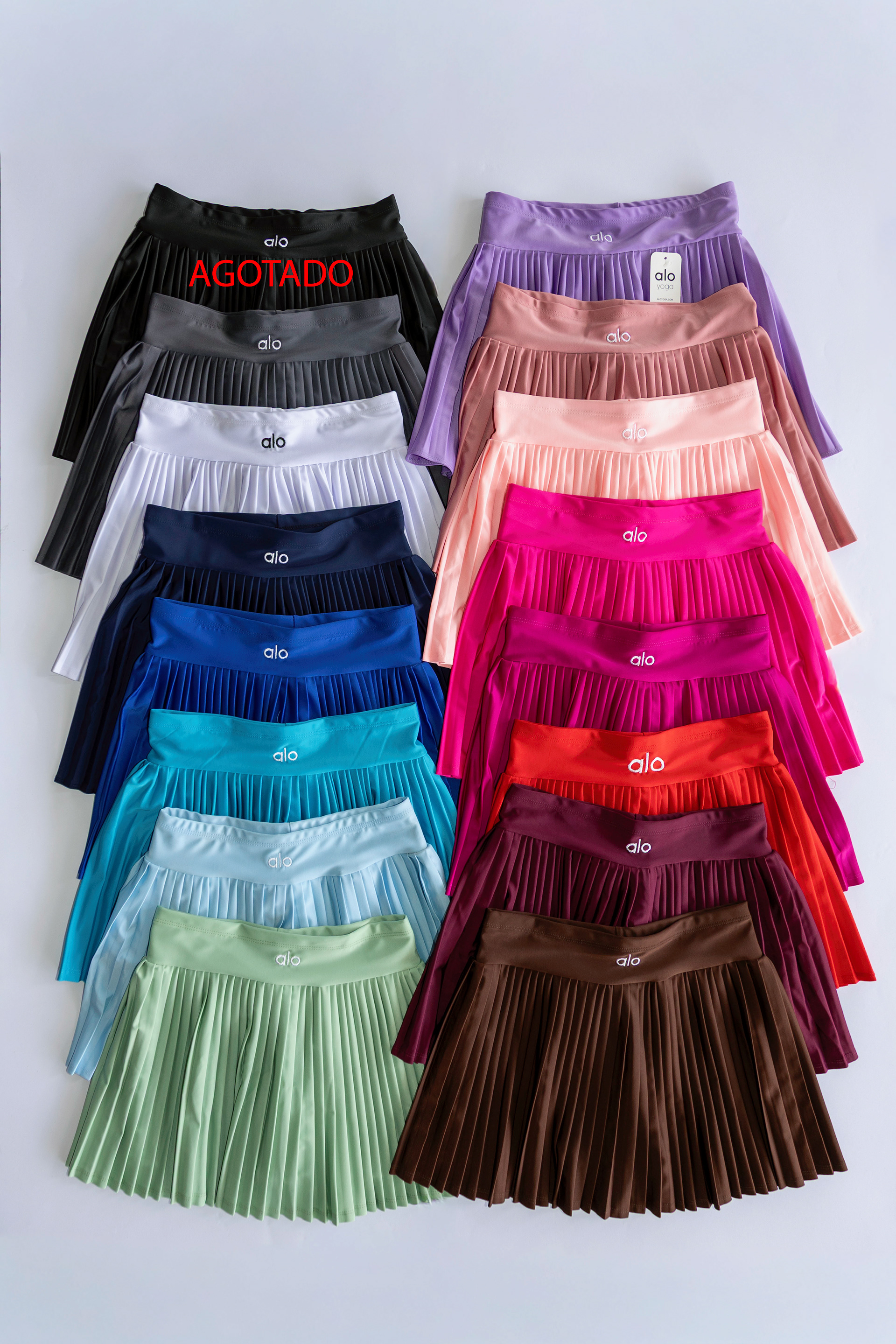 FALDA SHORT UNI / $155 - licra colombia, logo bordado