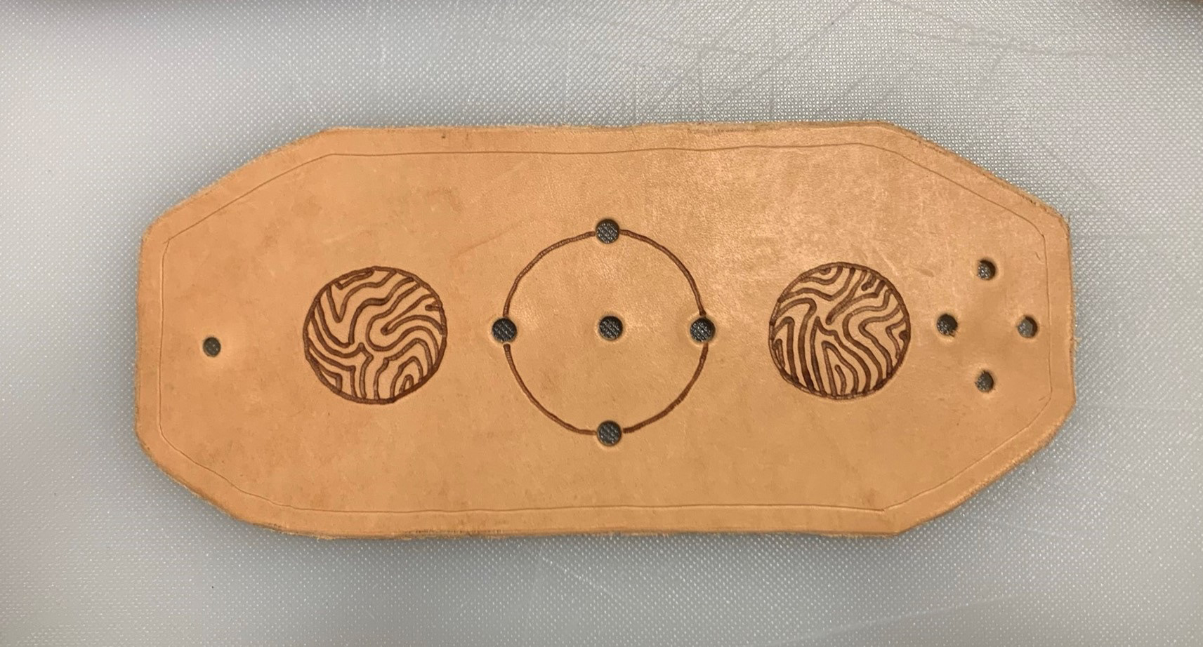 Pyrography on Veg. Tanned Leather pre-stained