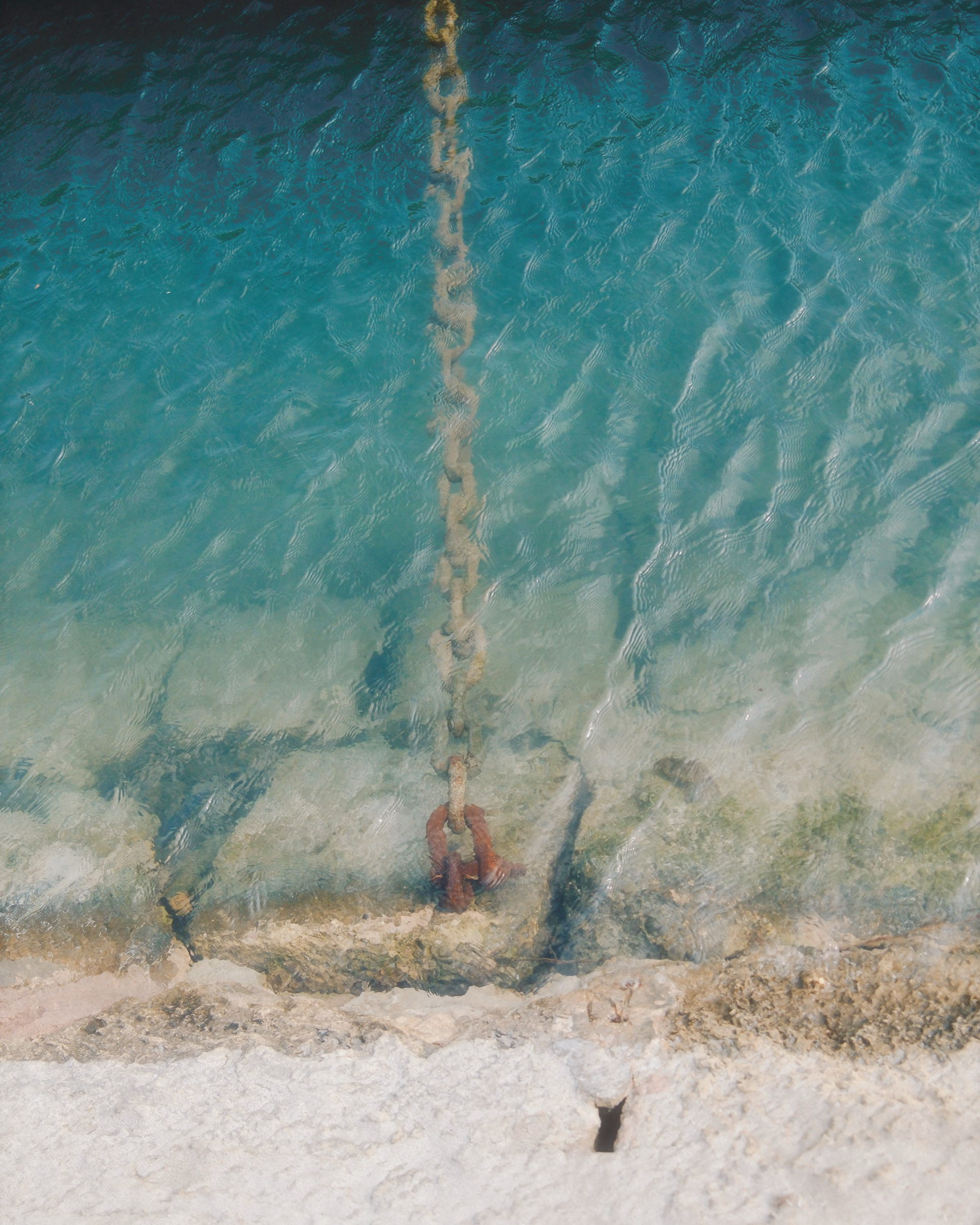 sea from the top, grading colors and chain from a boat