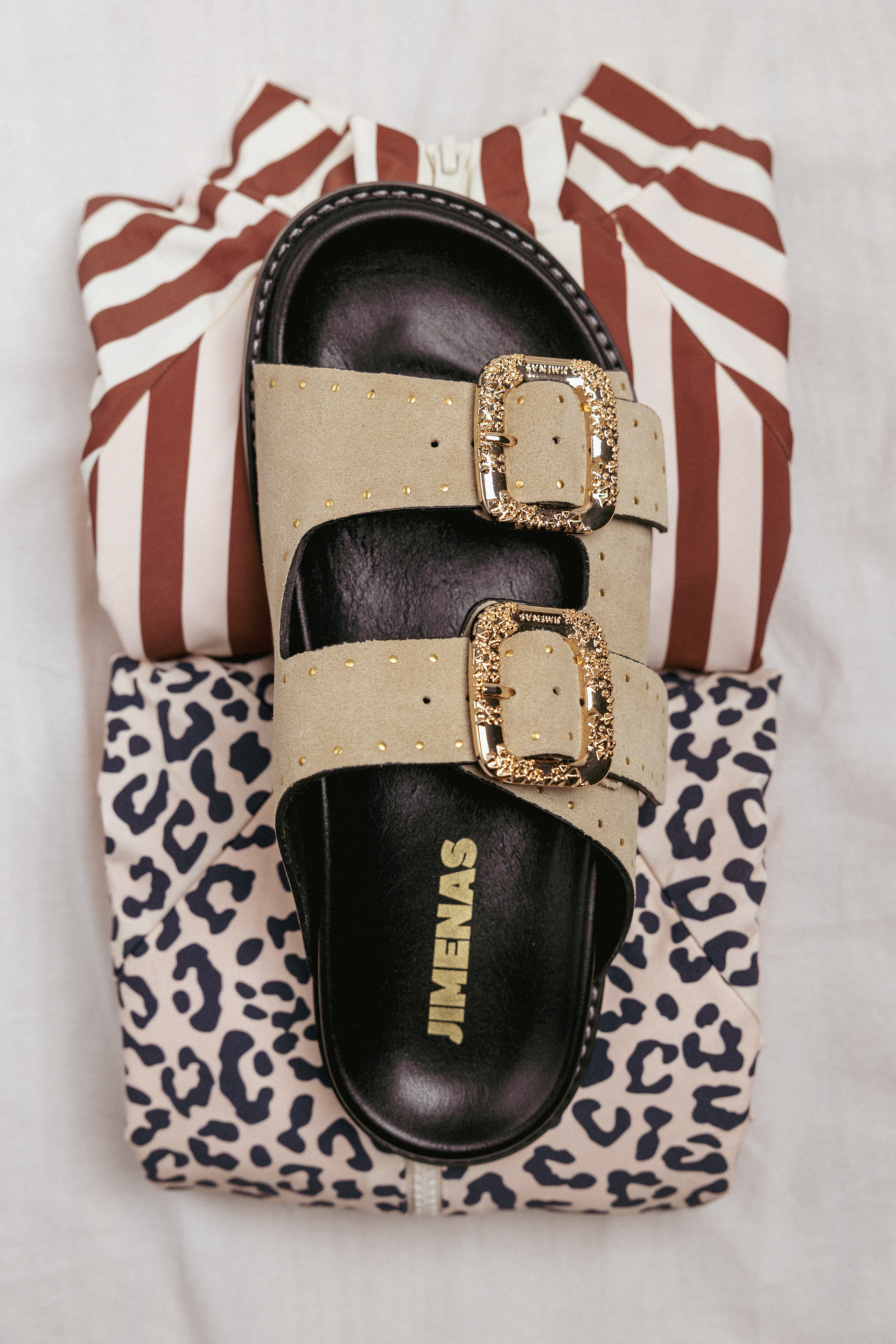 still life photography with minimal estetic, with sandals by Jimenas and Van swimwear