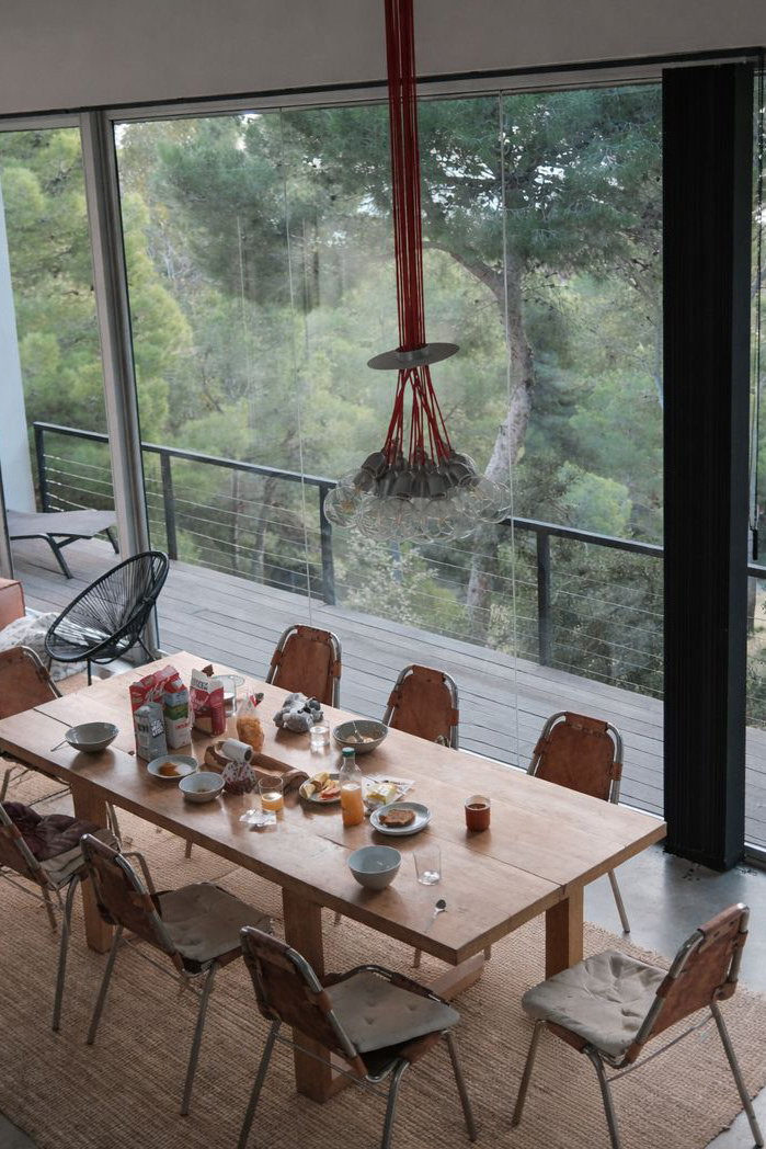 impressive house in the Costa Brava with huge windows on the woods, design living room like Milk magazine interior editorial by photographer based in Barcelona Claudia Bonazzi