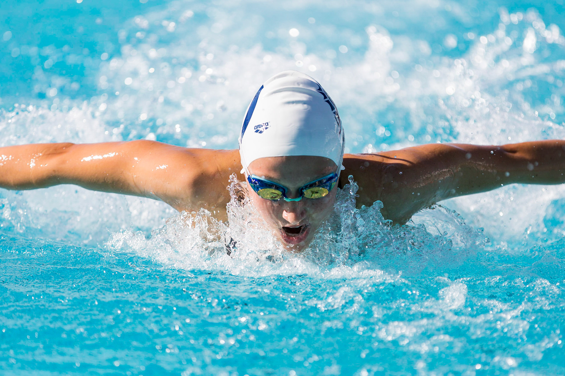 Sports photograph of a swimmer doing the butterfly in Clovis, CA