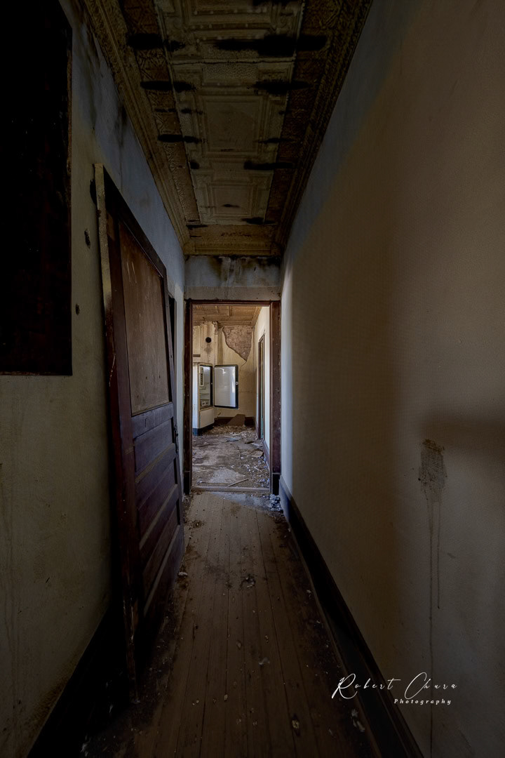 Down the Hall Next to the Fridge