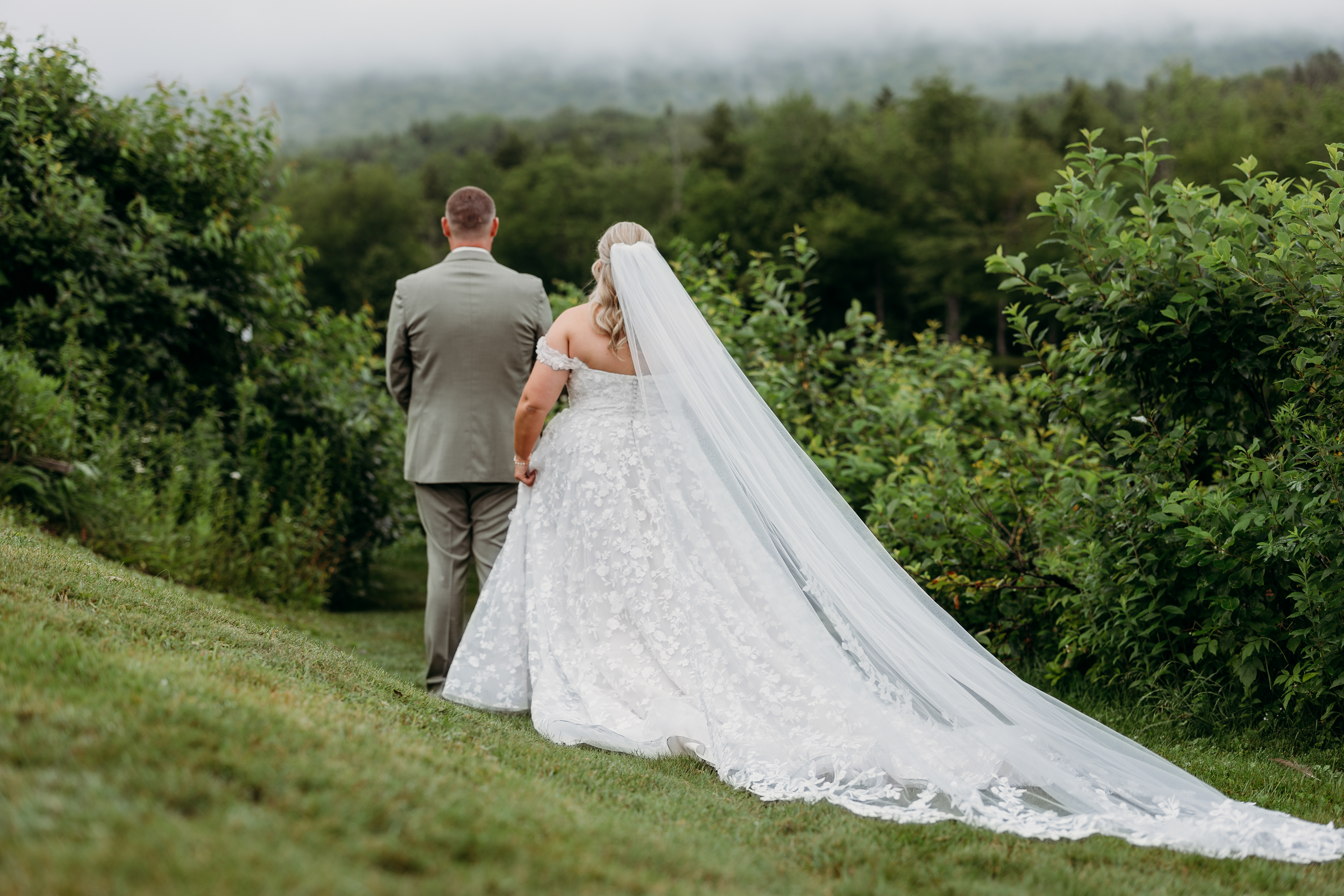 A foggy New Hampshire morning wrapped their first look in magic — just the two of them, the river, and forever.