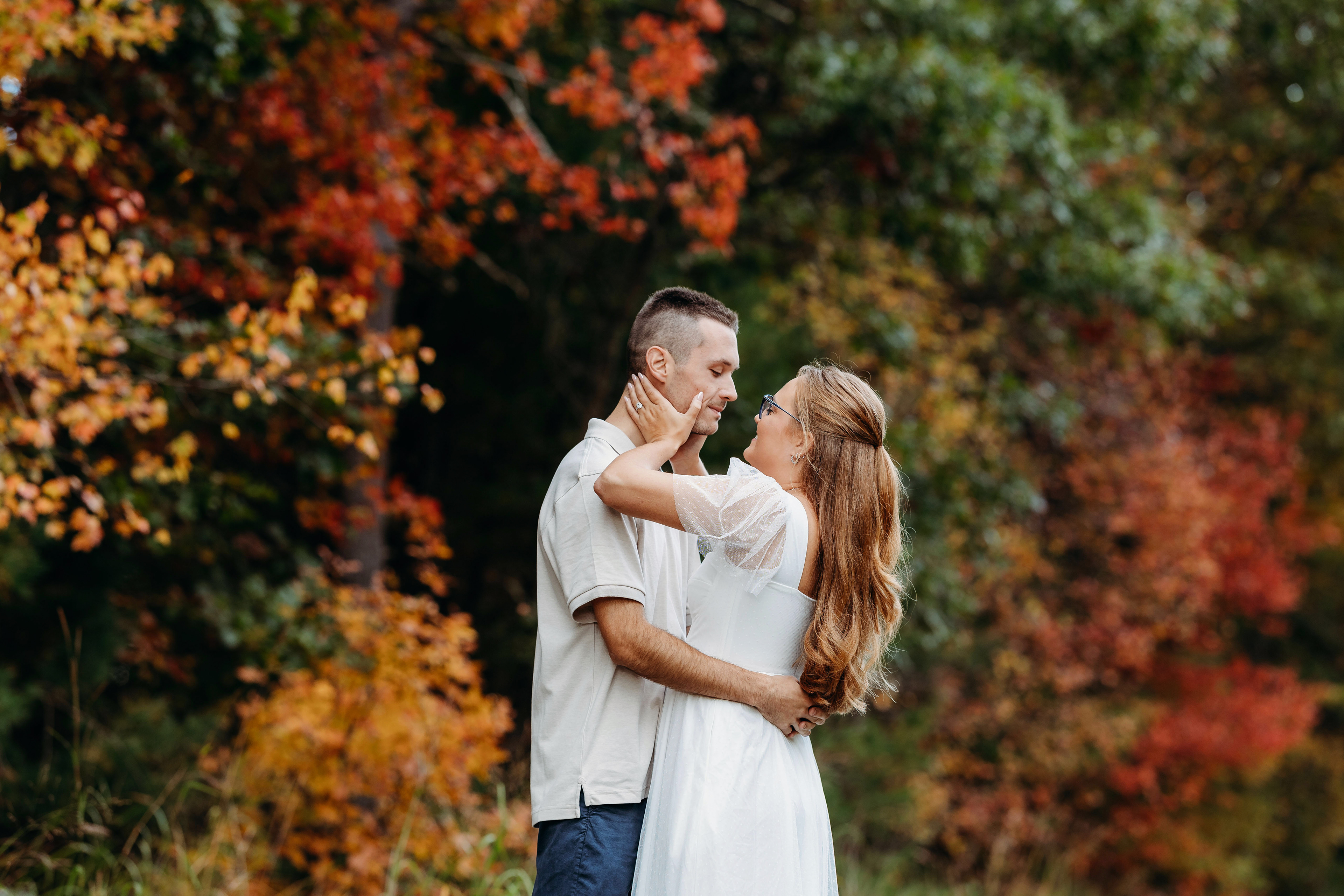 When the wind plays with your hair and love takes center stage — timeless NH engagement photos.