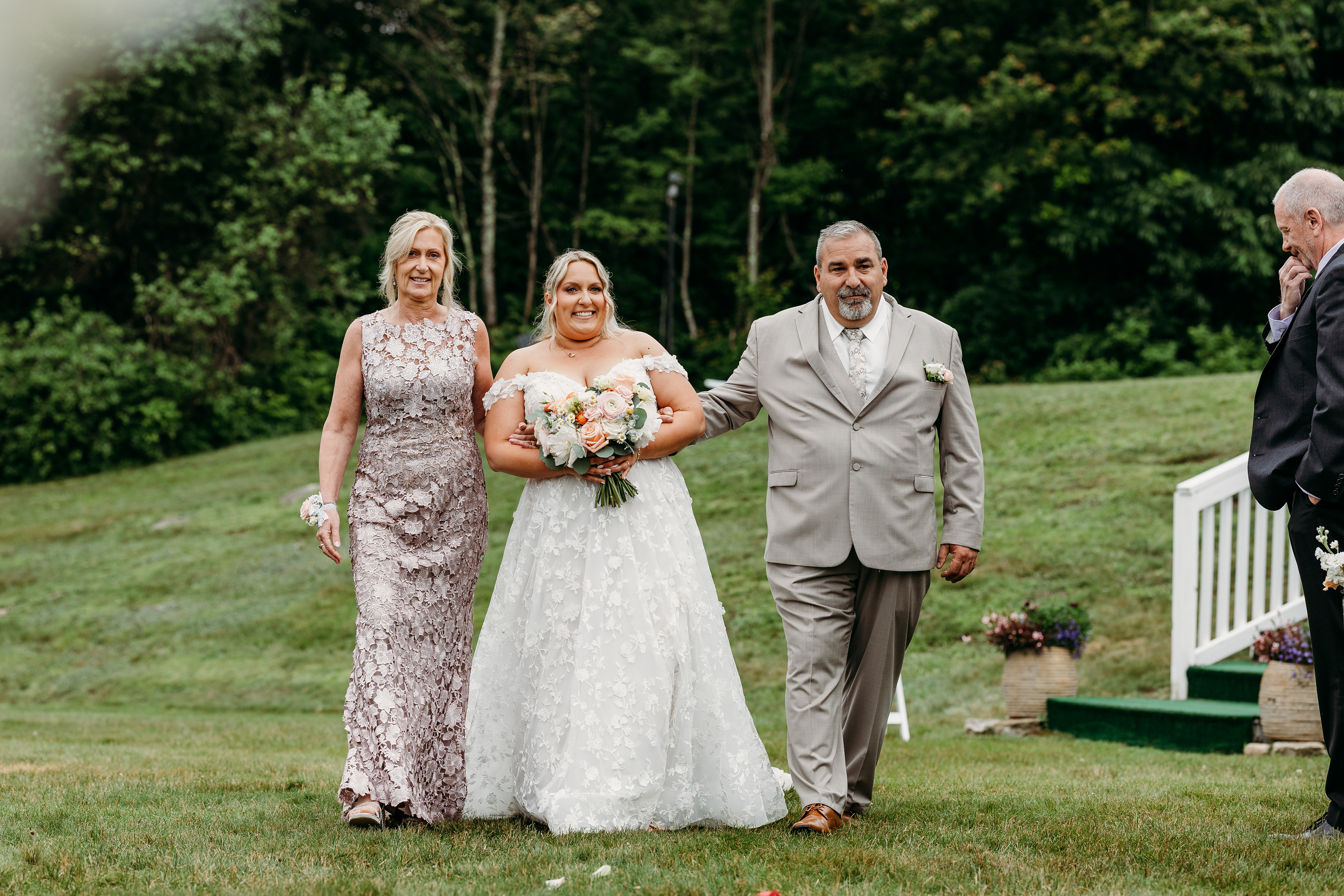That moment between breath and motion — bride walking toward her forever with love in her eyes.