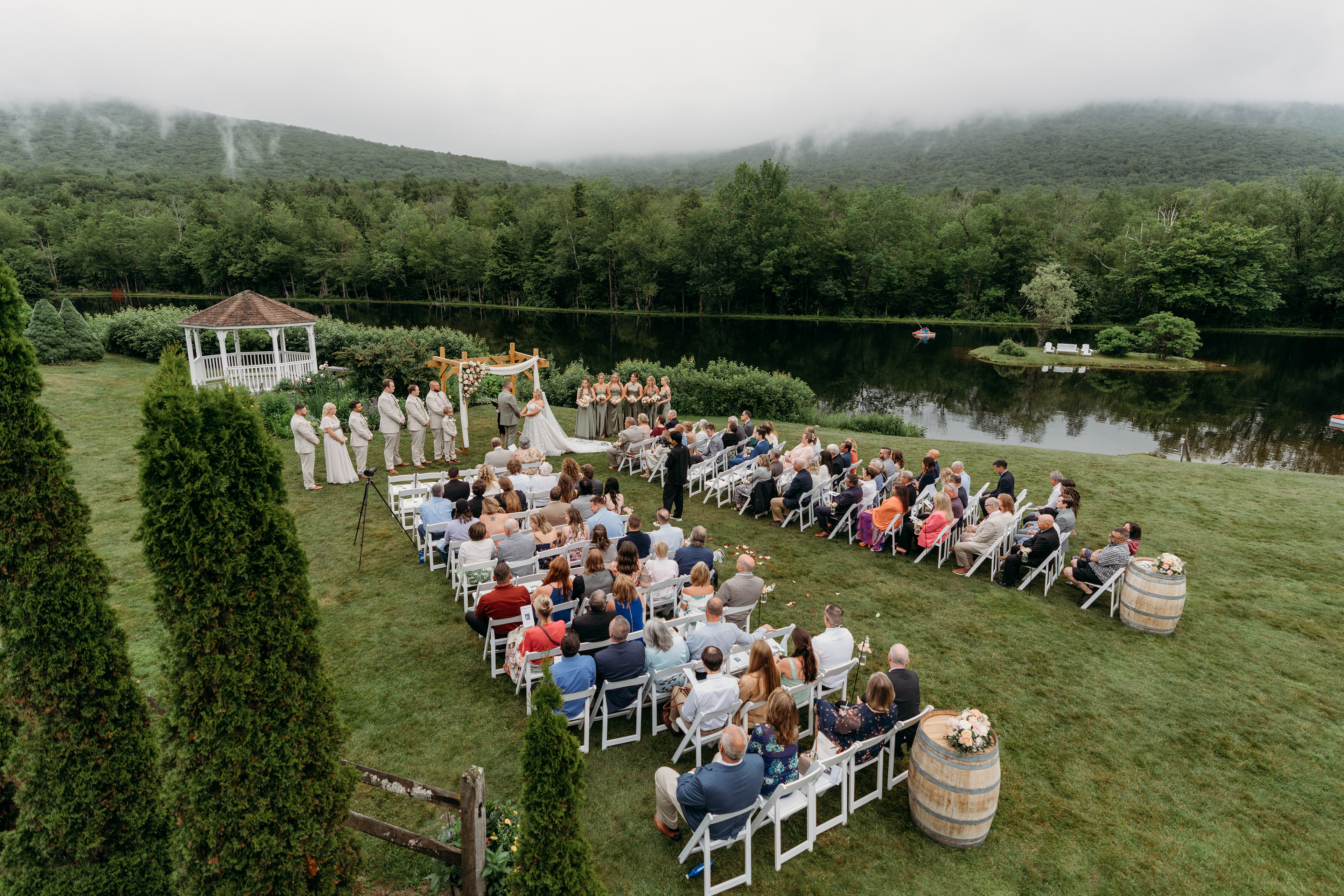 The aisle lined with florals and smiles — a New England wedding scene that felt right out of a dream.