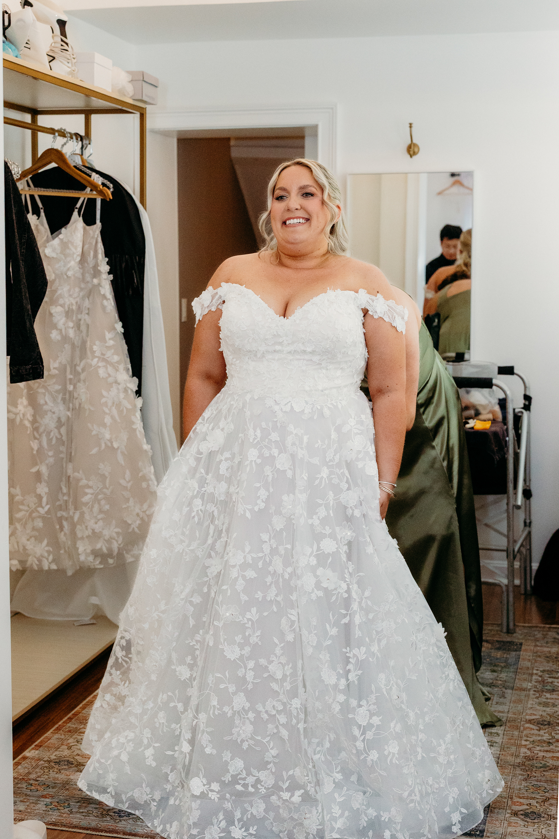 Lace gown, vintage earrings, and mountain air — wedding morning magic at Indian Head Resort, NH.