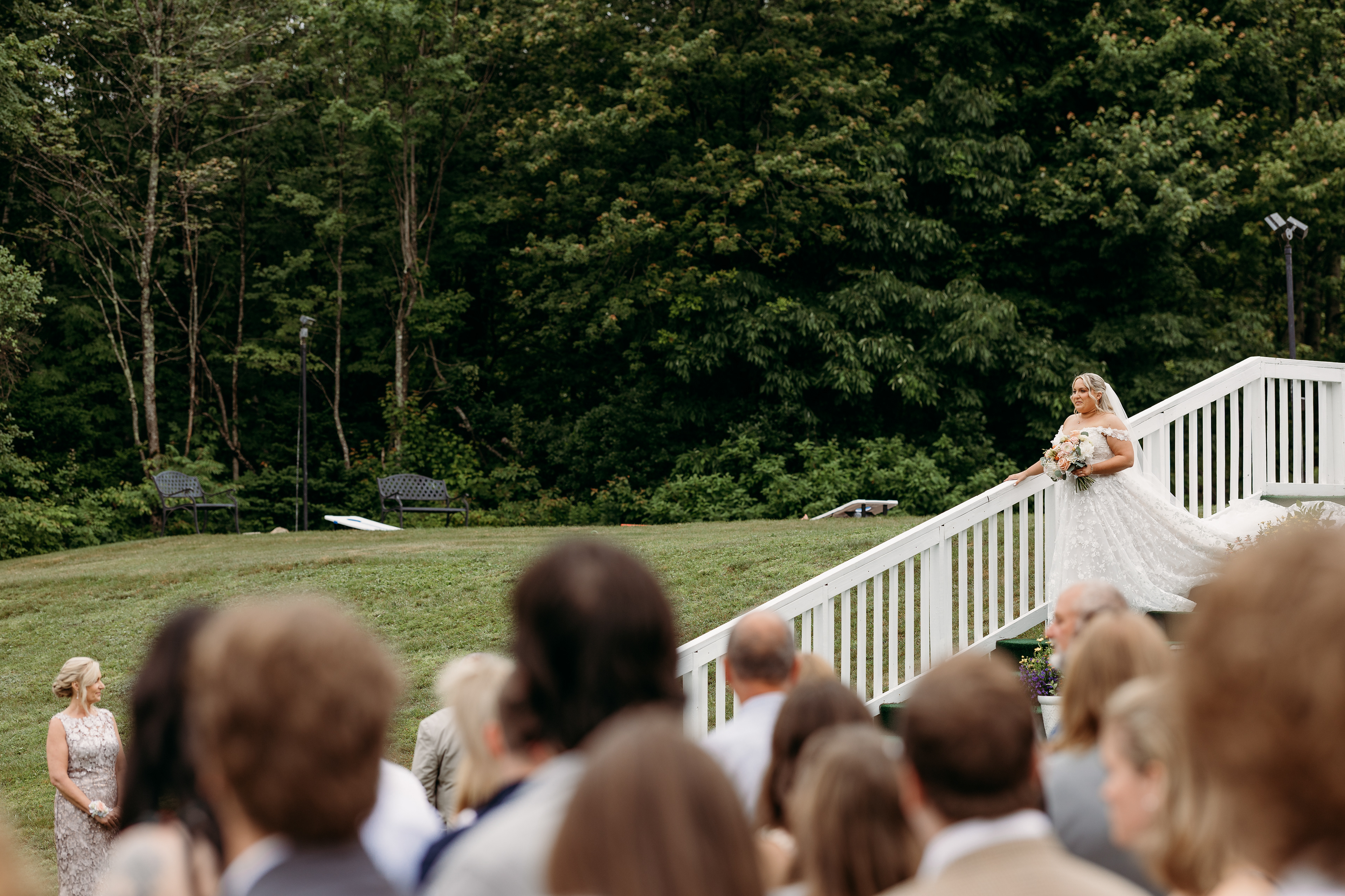 The moment she stepped down the aisle — quiet grace, steady heart, the mountains holding witness.