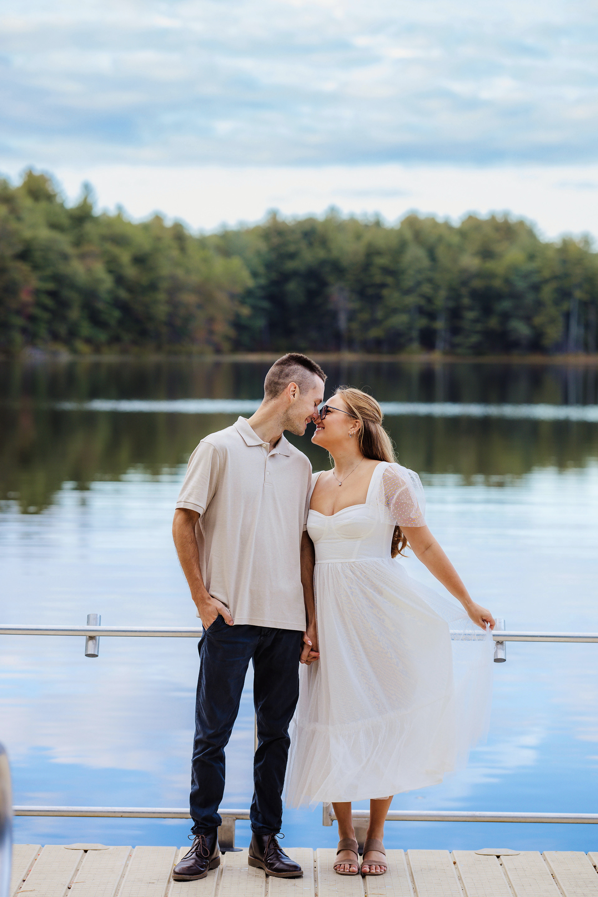 Genuine smiles and cozy hugs captured by a New Hampshire wedding photographer who loves candid moments.