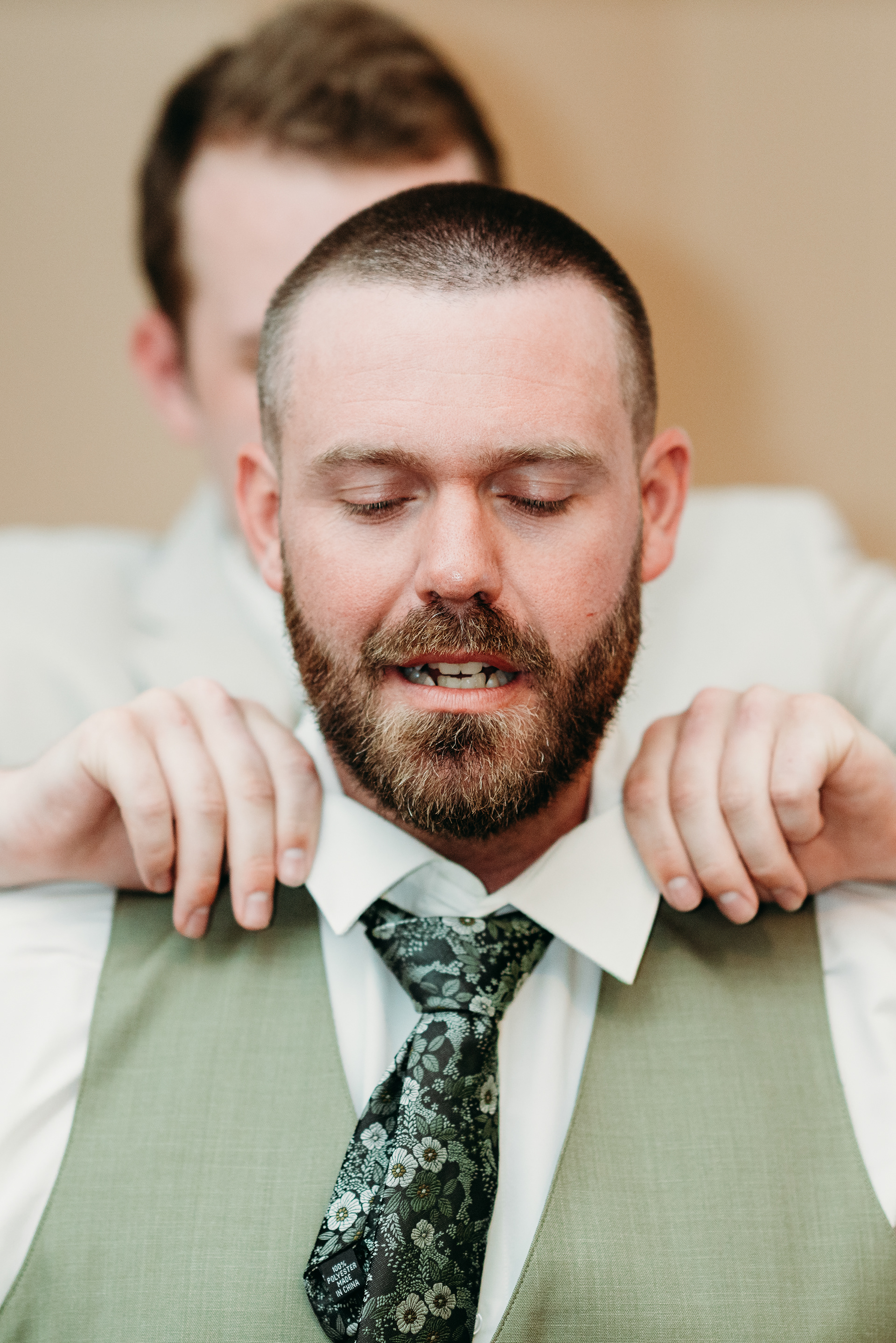 Groomsmen helping with ties and laughs echoing through the Indian Head Resort — easygoing morning before ‘I do.’