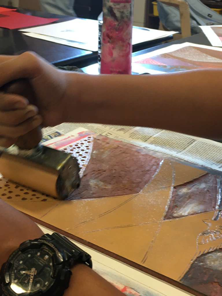 Applying the ink with the roller on mdf sheet