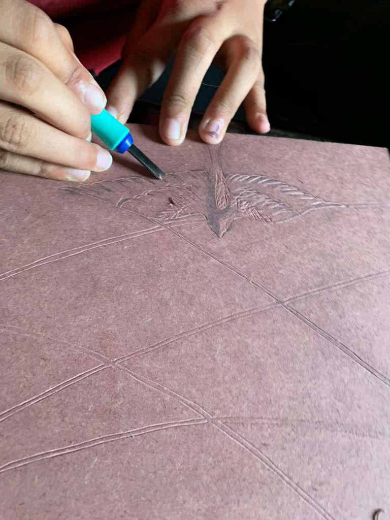 Carving with woodcut tools on mdf sheet