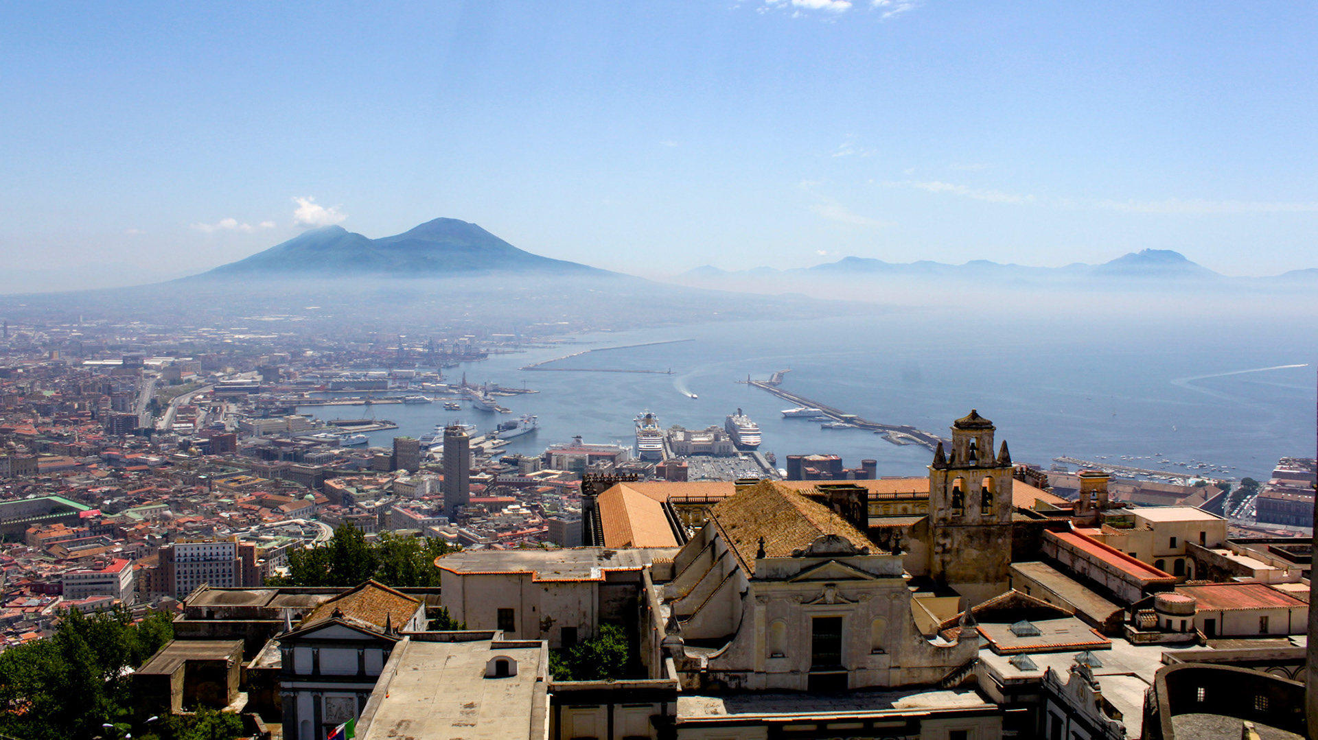 Panoramic view of the harbour in Naples with Mount Vesuvio