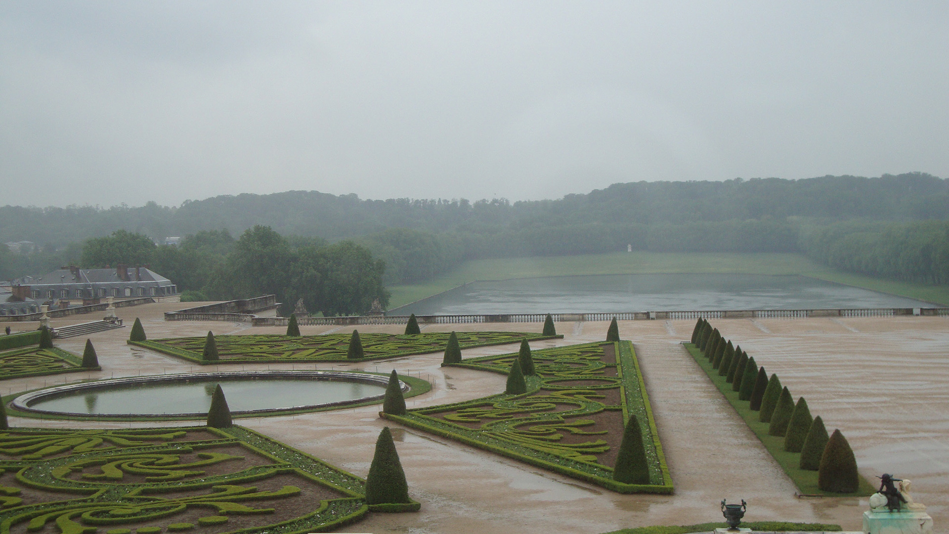 Gardens of Versailles with heavy rain.