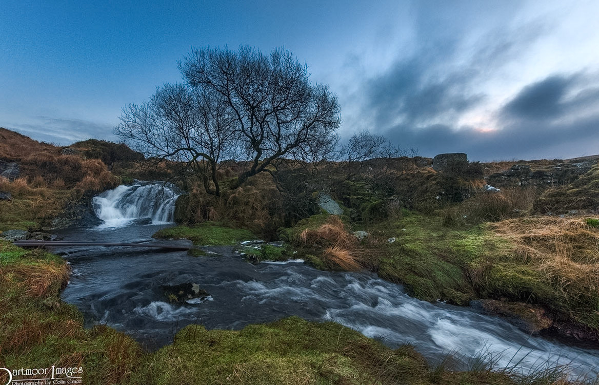 An early morning photograph of the River Meavy tumbling over the Black Tor Falls on its way to the reservoir at Burrator.