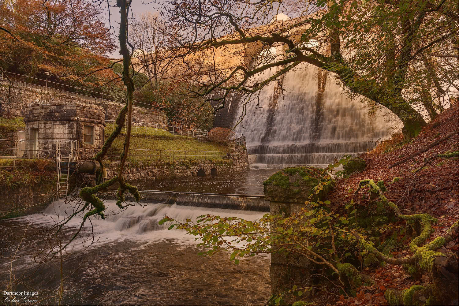 After months of no rain over the moors a recent period of heavy downpours means that Burrator Reservoir is toped up again. The water level is such, that it flows over the dam and on into the River Meavy.