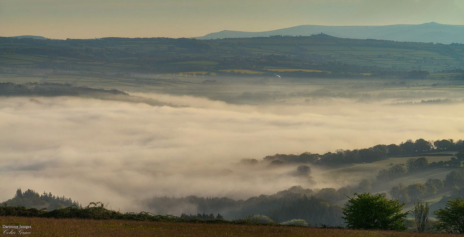 A misty and foggy start to a spring day in Cornwall as seen from Kit Hill near Callington.