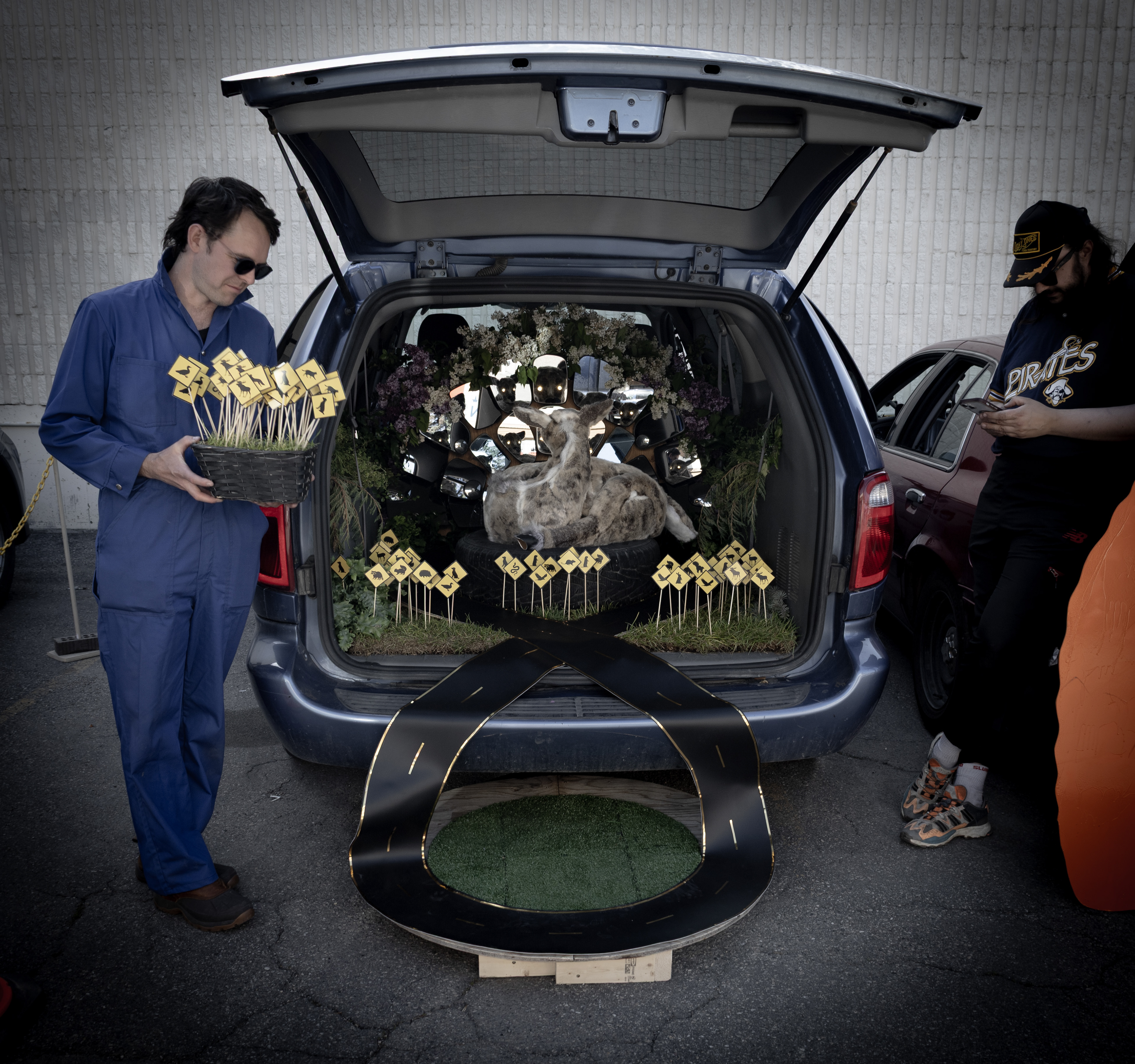 I asked this guy if he was a professional installation artist or if he was just real stoked to decorate his car weird