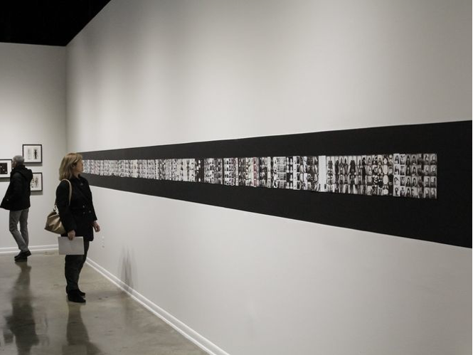 10 Years of Photobooth Self-Portraits on display at the Center Galleries in Detroit in 2016.