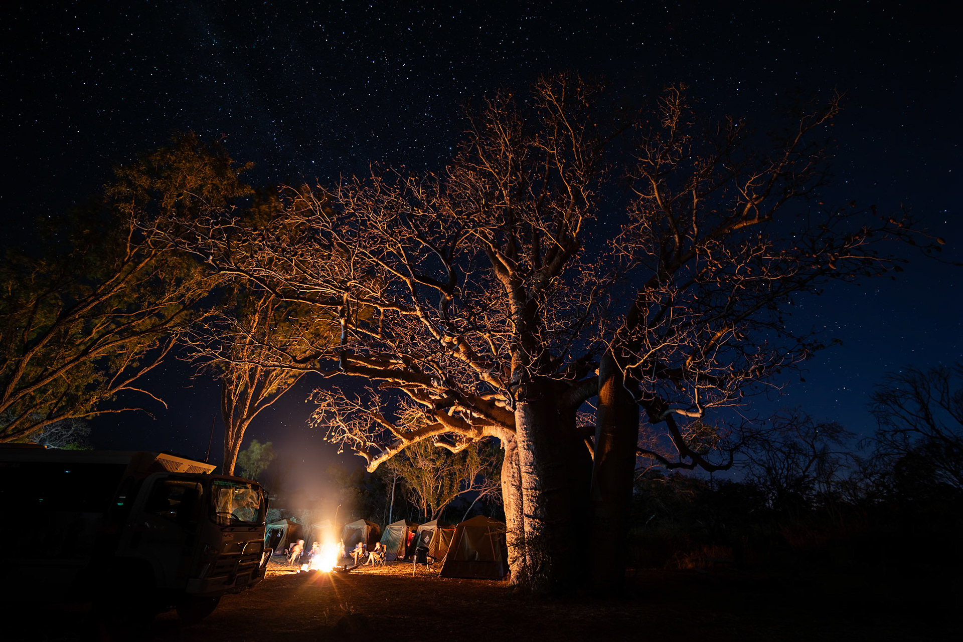 Sharing the days travel stories around the campfire