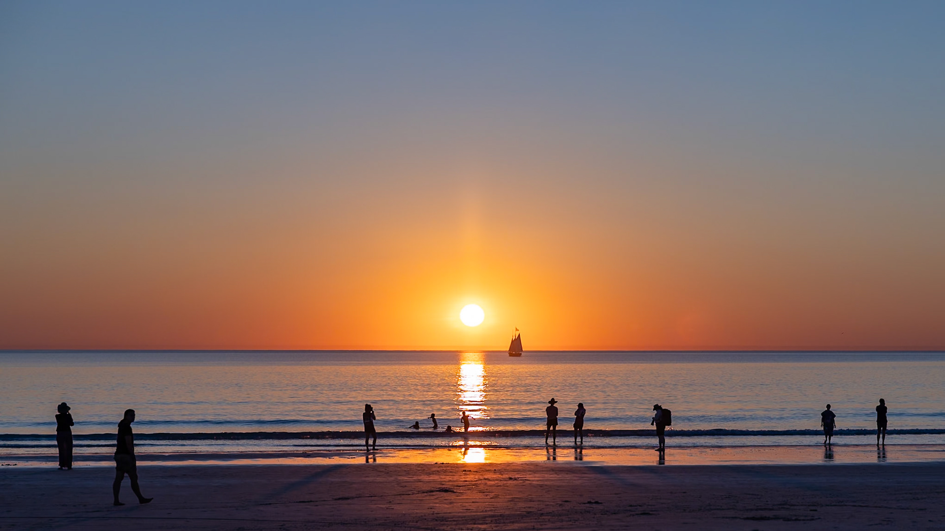 Enjoying an evening at the beach whilst watching the setting sun