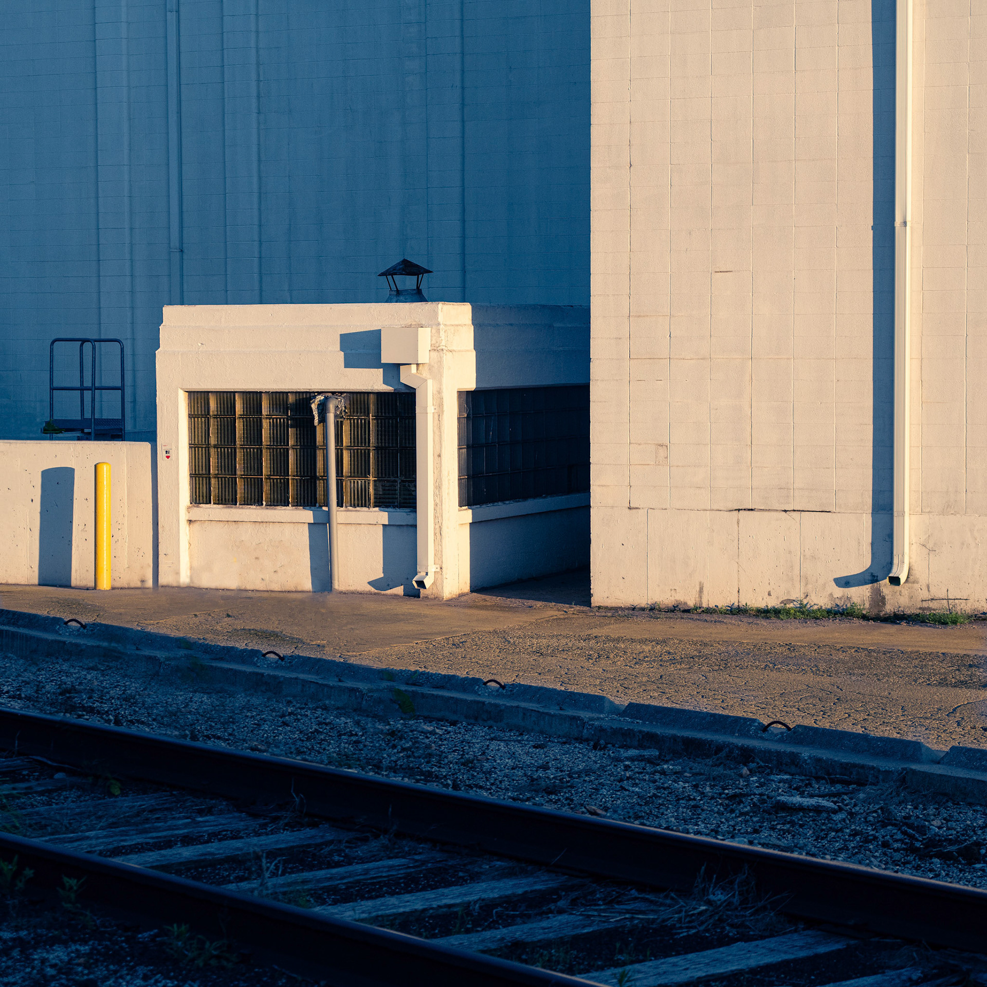 Track Behind Building (2021)
