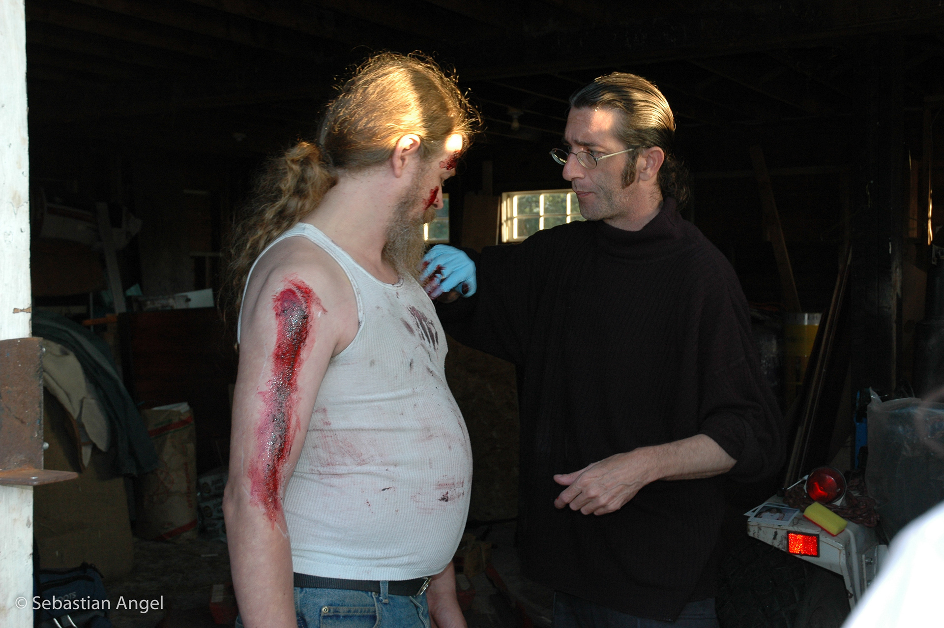 Makeup Artist John Jordan working on Actor Norman Hirschfeldt.