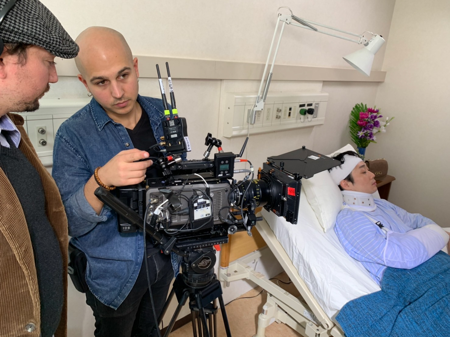 Director Sebastian Angel and DOP Hans Bobanovits discussing the shot. Camera, Arri Amira. 