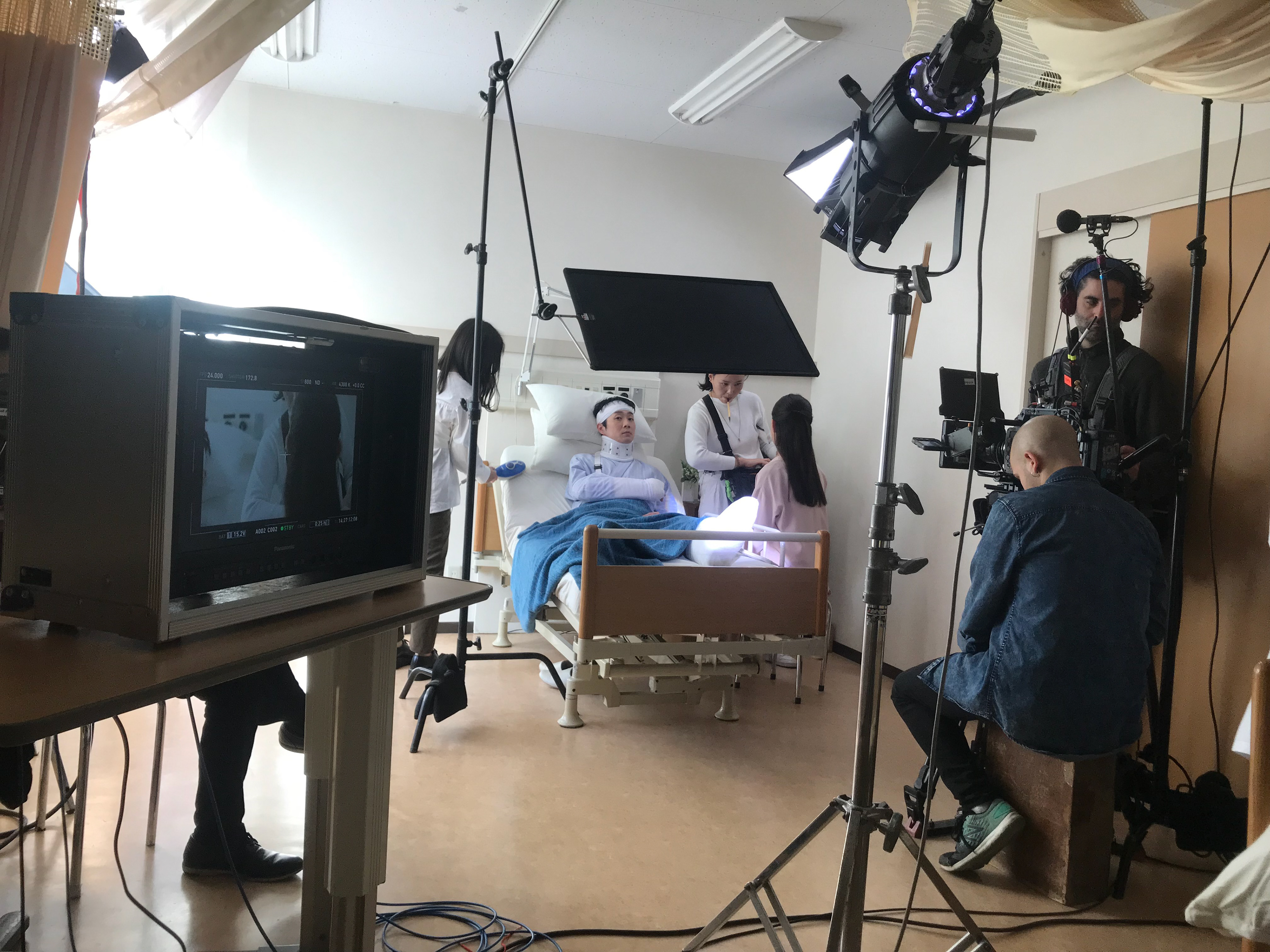 Hair and Makeup adjustments between shots. 