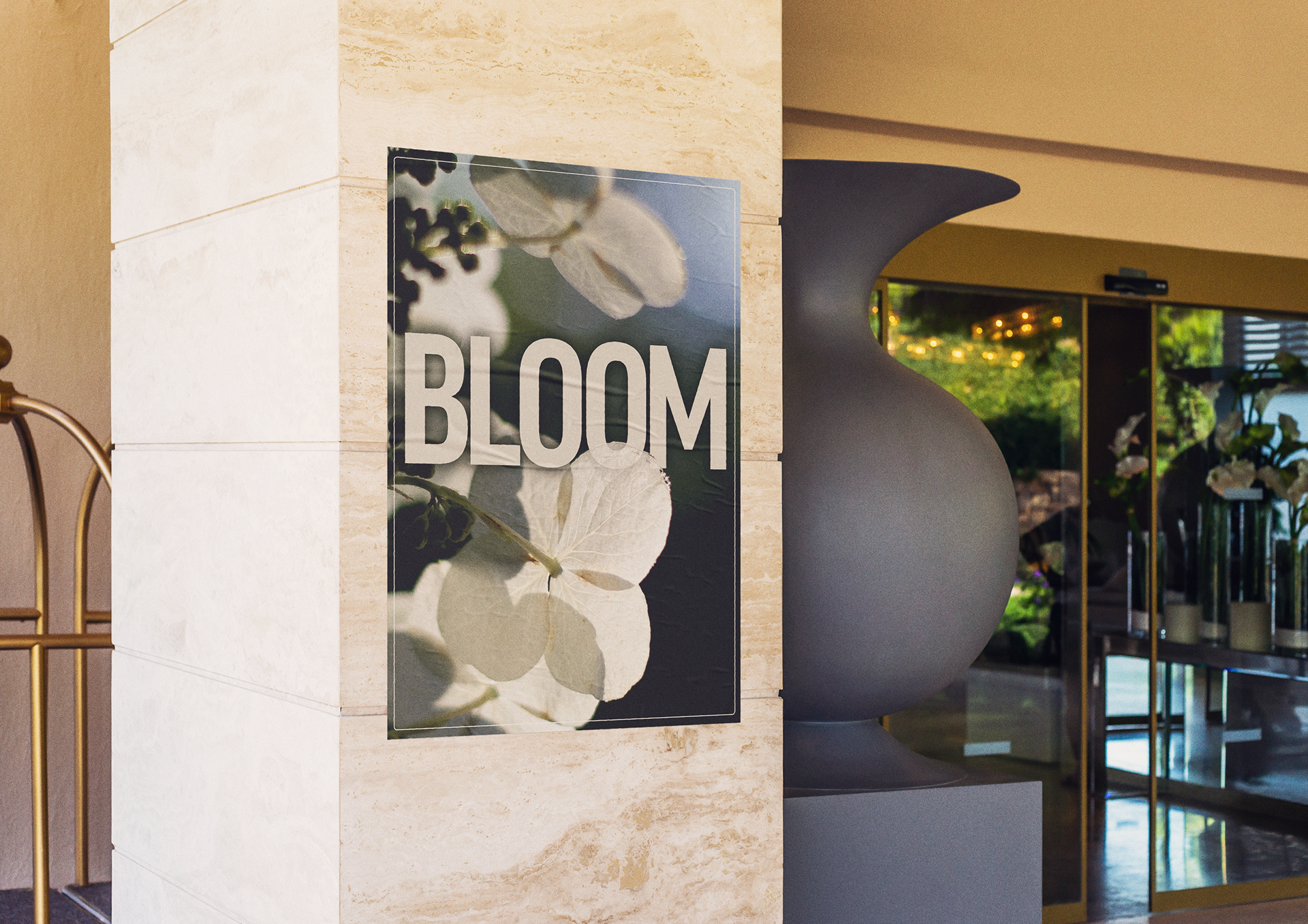 Bloom poster with white flowers hanging outside a building entrance