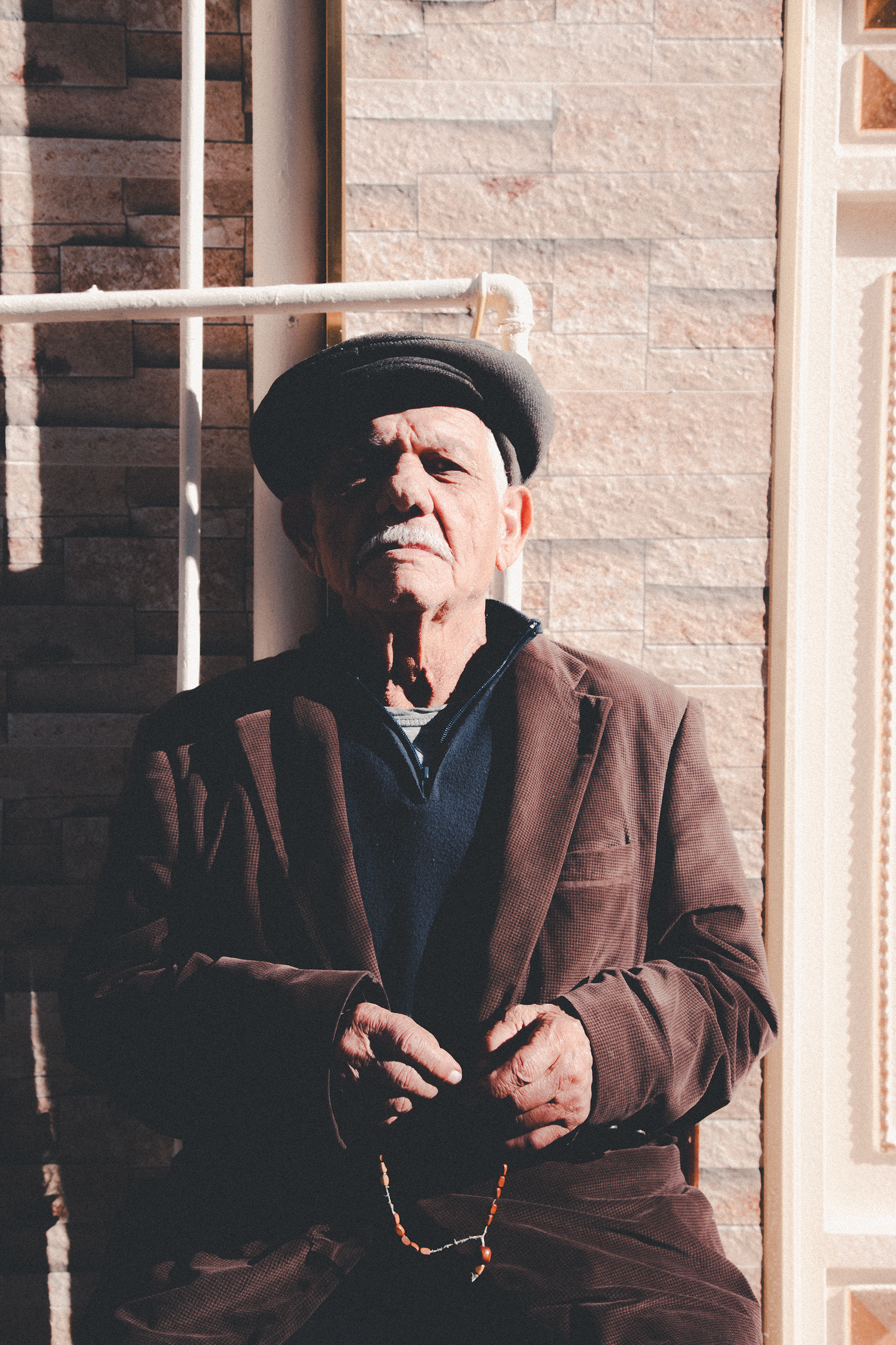 Old man looking to camera