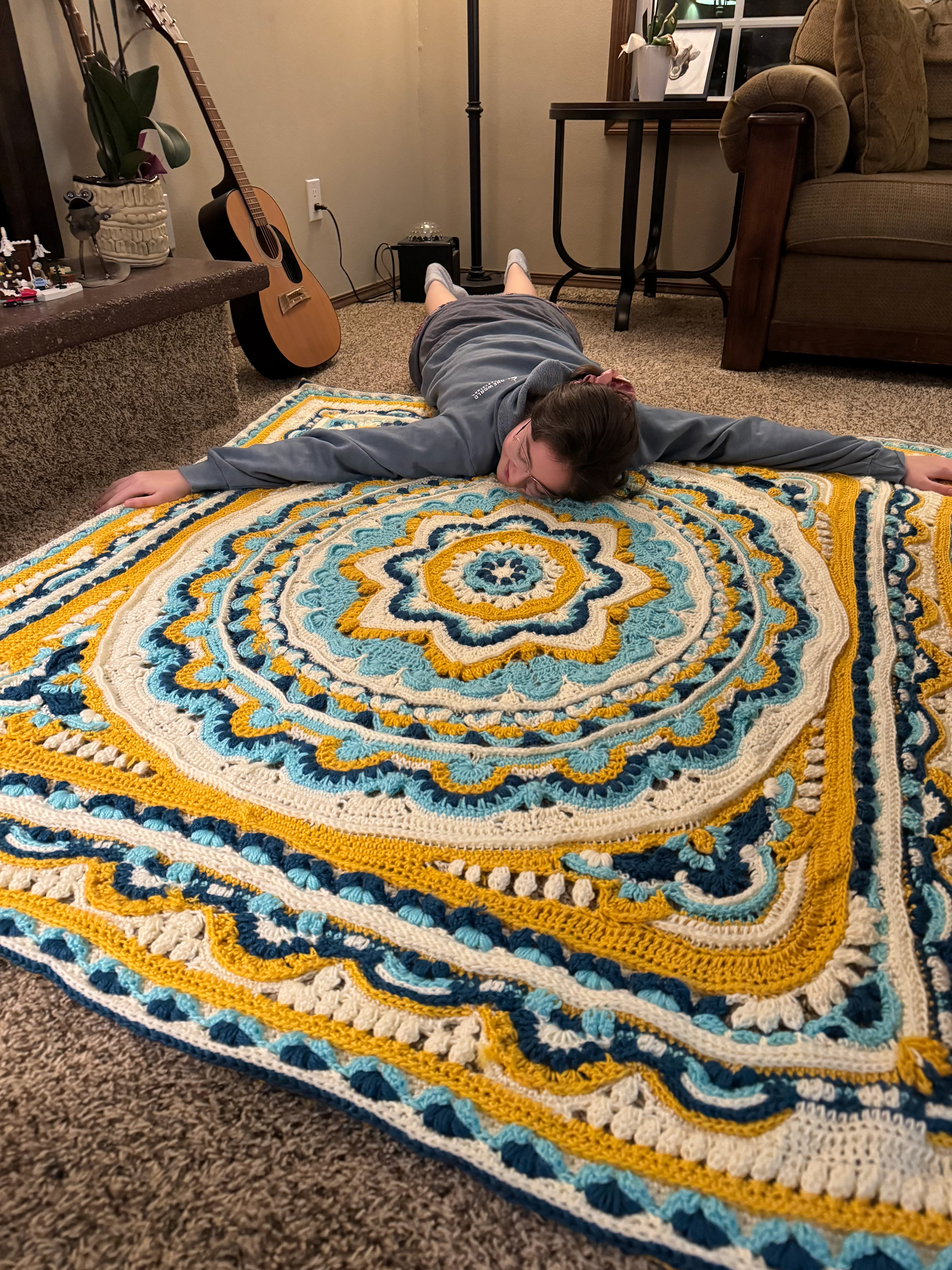 Crochet Blanket: This blanket took me 1.5 years to make with a year long break in between. The break originally ceased because I decided to finish up the blanket for my boyfriend to decorate his dorm with. However once I started to reach the end I had to tell him "I'm not sure if I'm willing to give this to you". When my dad saw it, he told me he would be furious if I gave it to my boyfriend because of how beautiful it was. 