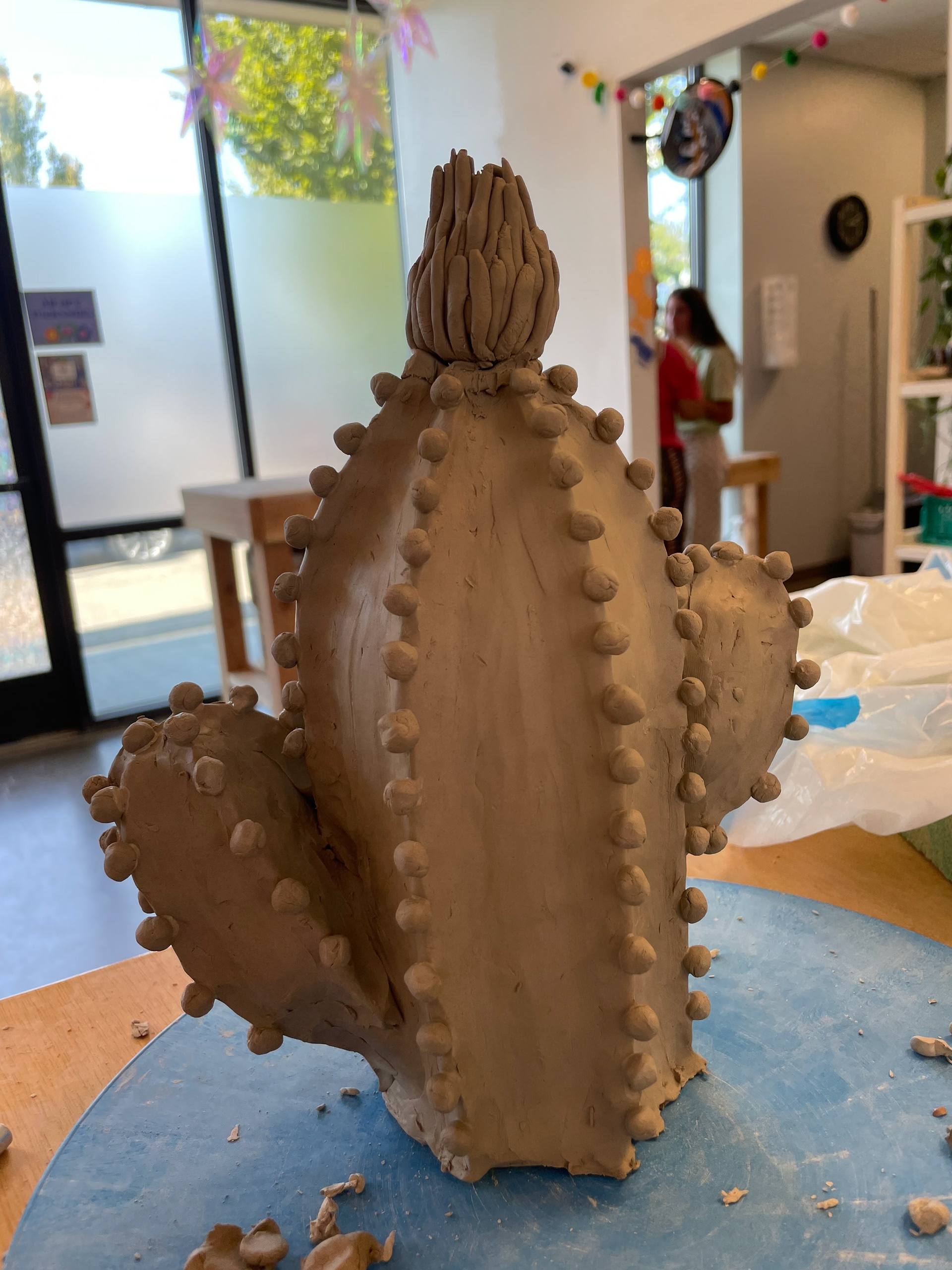 Cactus: I got the idea for this guy while falling asleep and spent three days working on it. The thing about clay sculptures is you have to create holes in your structure so the clay can dry out. Otherwise, moisture gets trapped inside and creates a mini bomb that will go off in the kiln. I did not put enough holes. It shattered. And took out several other pots. I waited about a week before I finally did the walk of shame with my pieces to the trash can (which was all the way across the other side of the room).