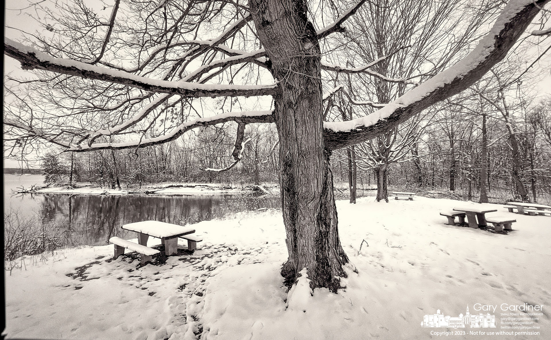 A few footprints mark the path of winter wanderers in the blanket of snow covering Red Bank Park the day after several inches of snow fell in the early morning. My Final Photo for January 23, 2023.  