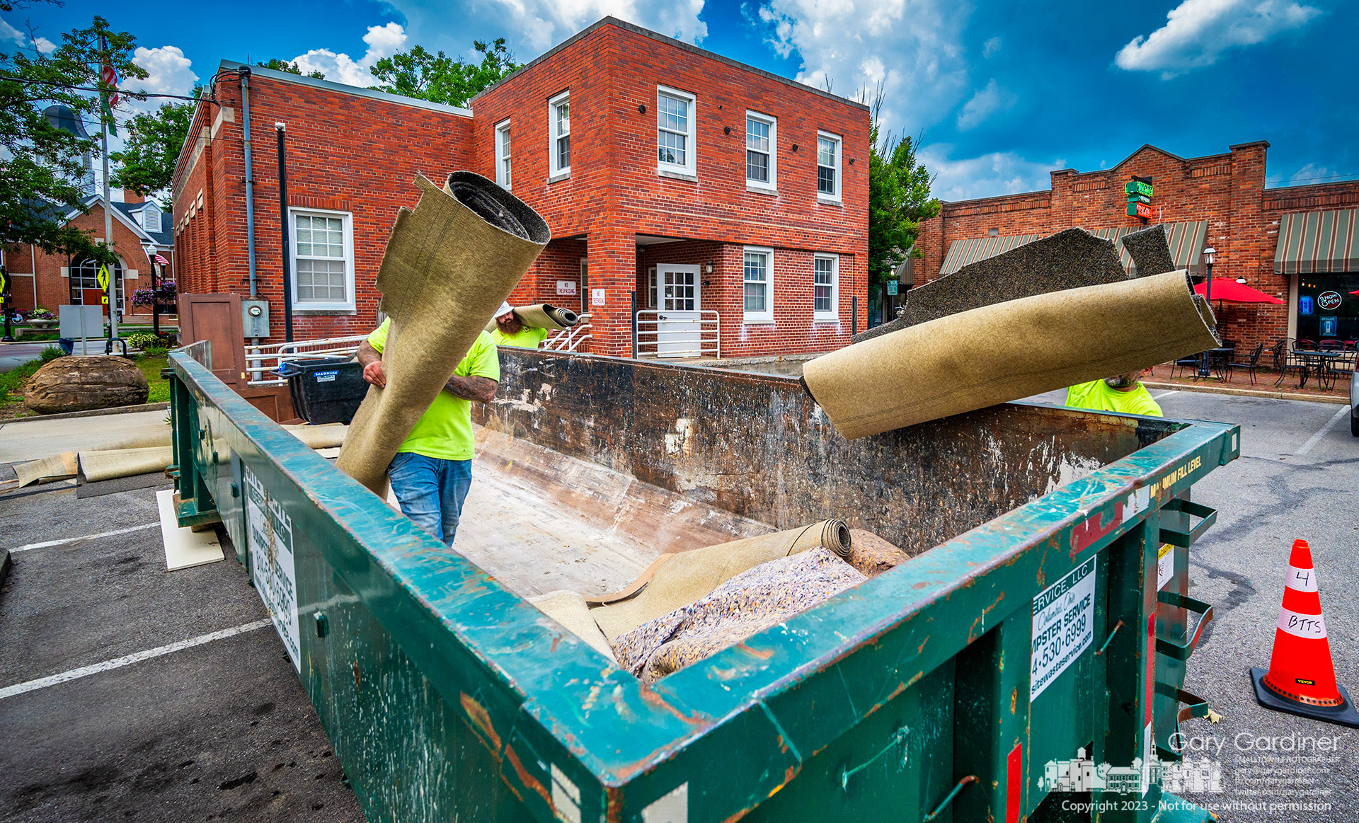 Workers remove carpeting, doors, and fixtures from the old post office in Uptown Westerville that recently was home to the detective division of the police department but will become a restaurant and speakeasy for High Bank Distillery in the home of the the Anti-Saloon League. My Final Photo for July 5, 2023. 