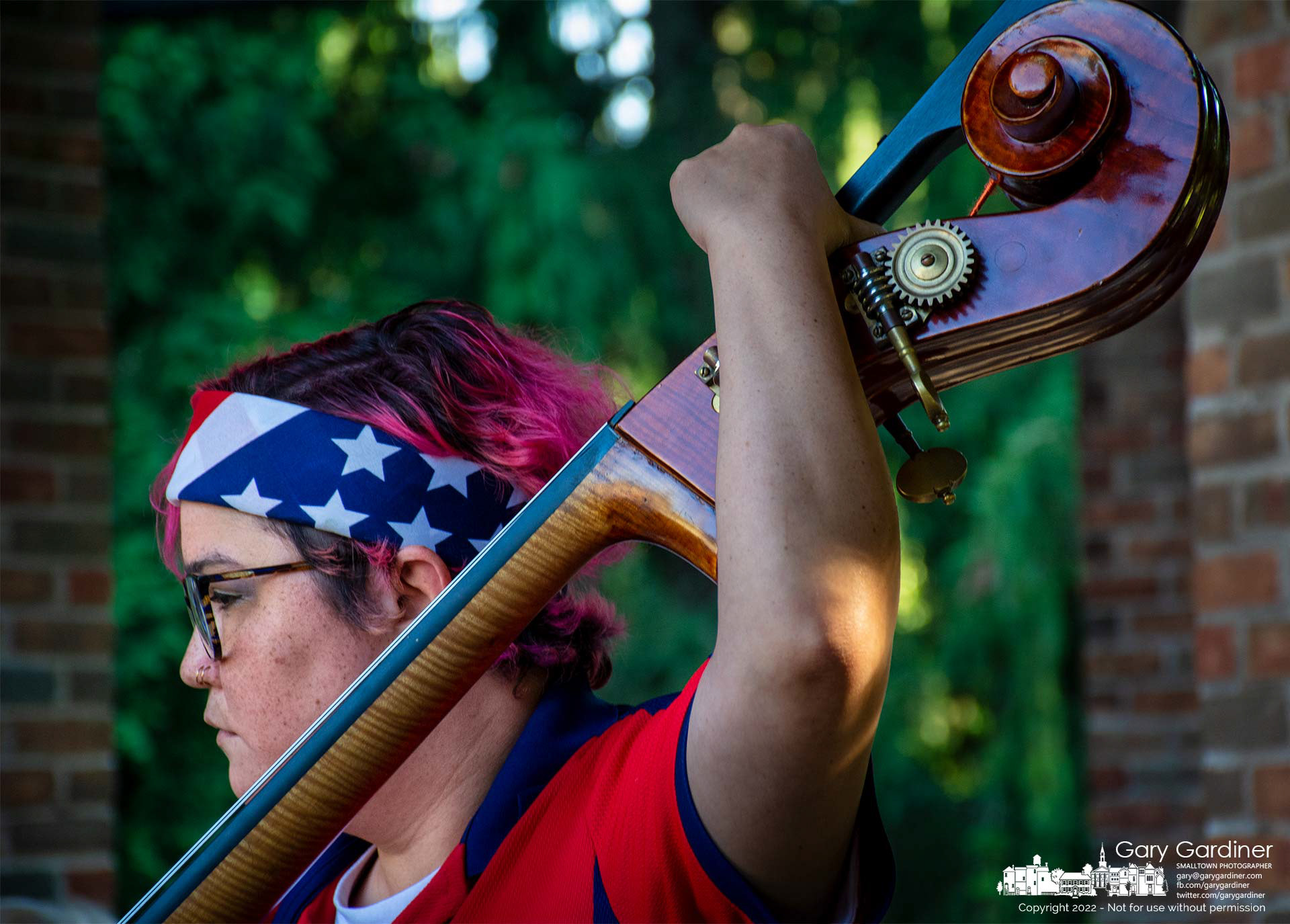 A bassist with the Westerville Symphony tunes her instrument before the "Sound of Freedom" concert at the Alum Creek amphitheater. My Final Photo for July 3, 2022.