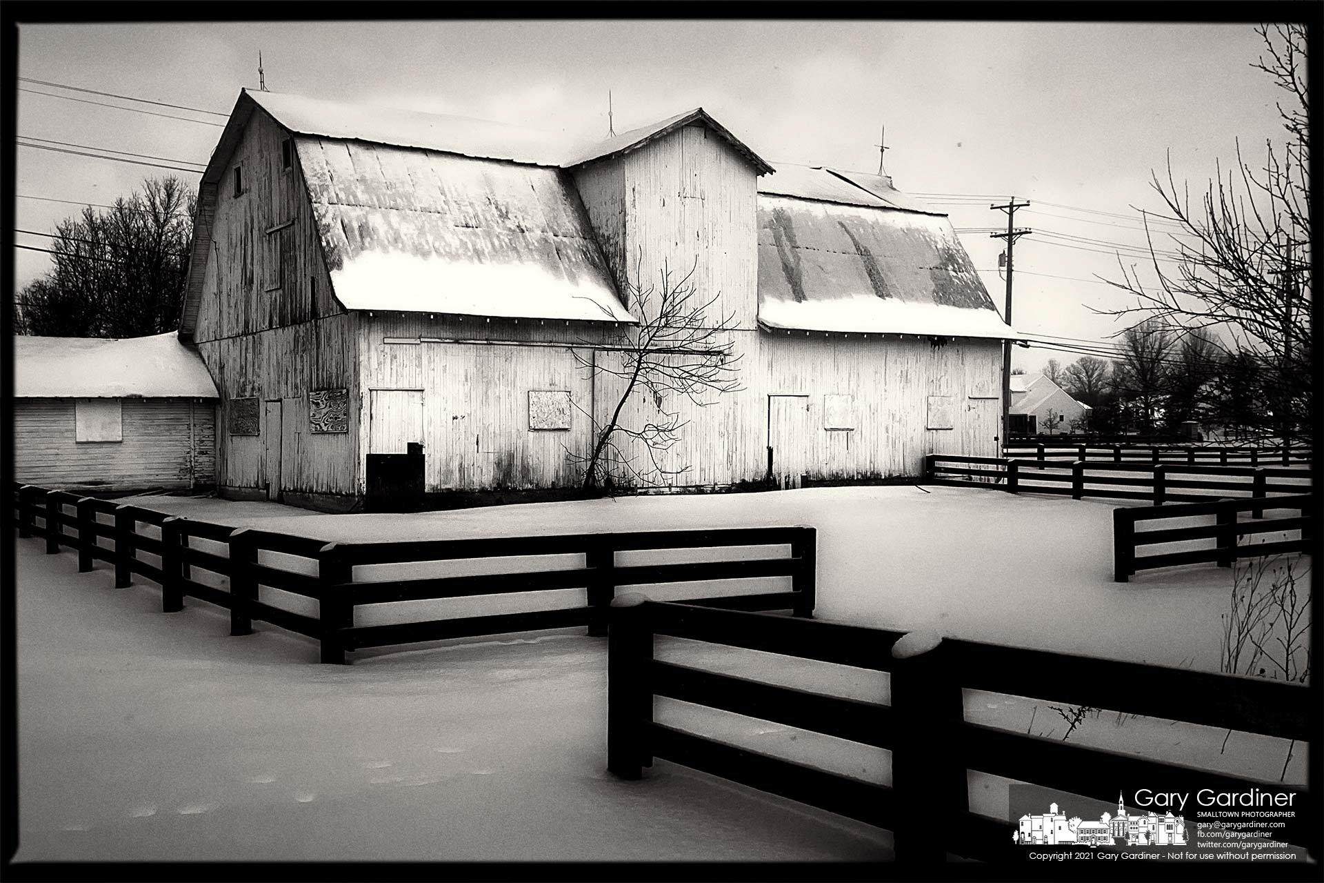 A blanket of snow and ice covers the barn and grounds on Old State Street in Genoa Township. My Final Photo for Feb. 16, 2021.