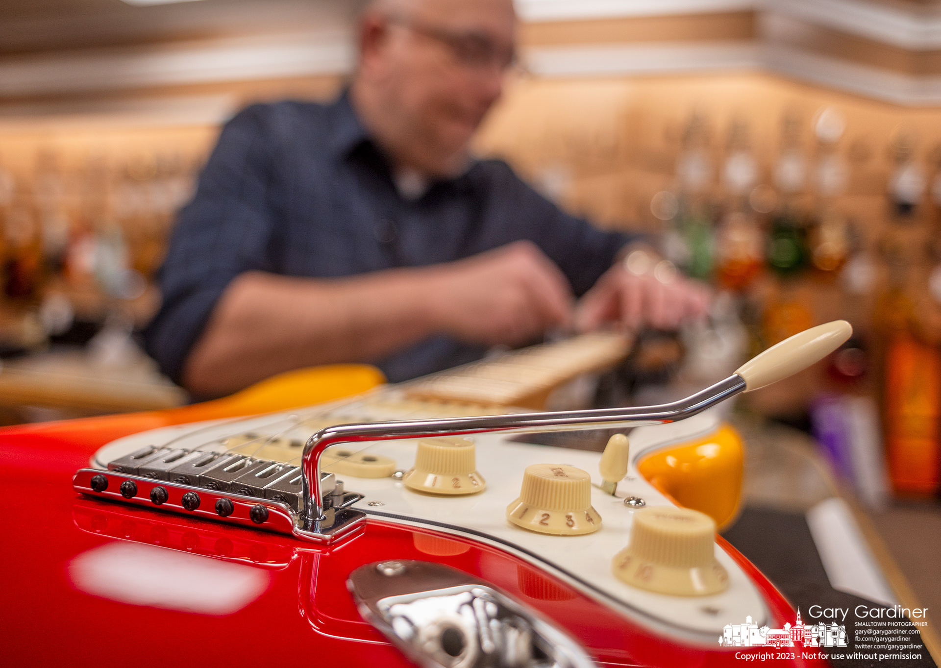 A Fender Stratocaster Player Plus guitar gets a tuneup and fret adjustment on the front counter of Music & Aerts in Uptown Westerville. My Final Photo for March 23, 2023. 