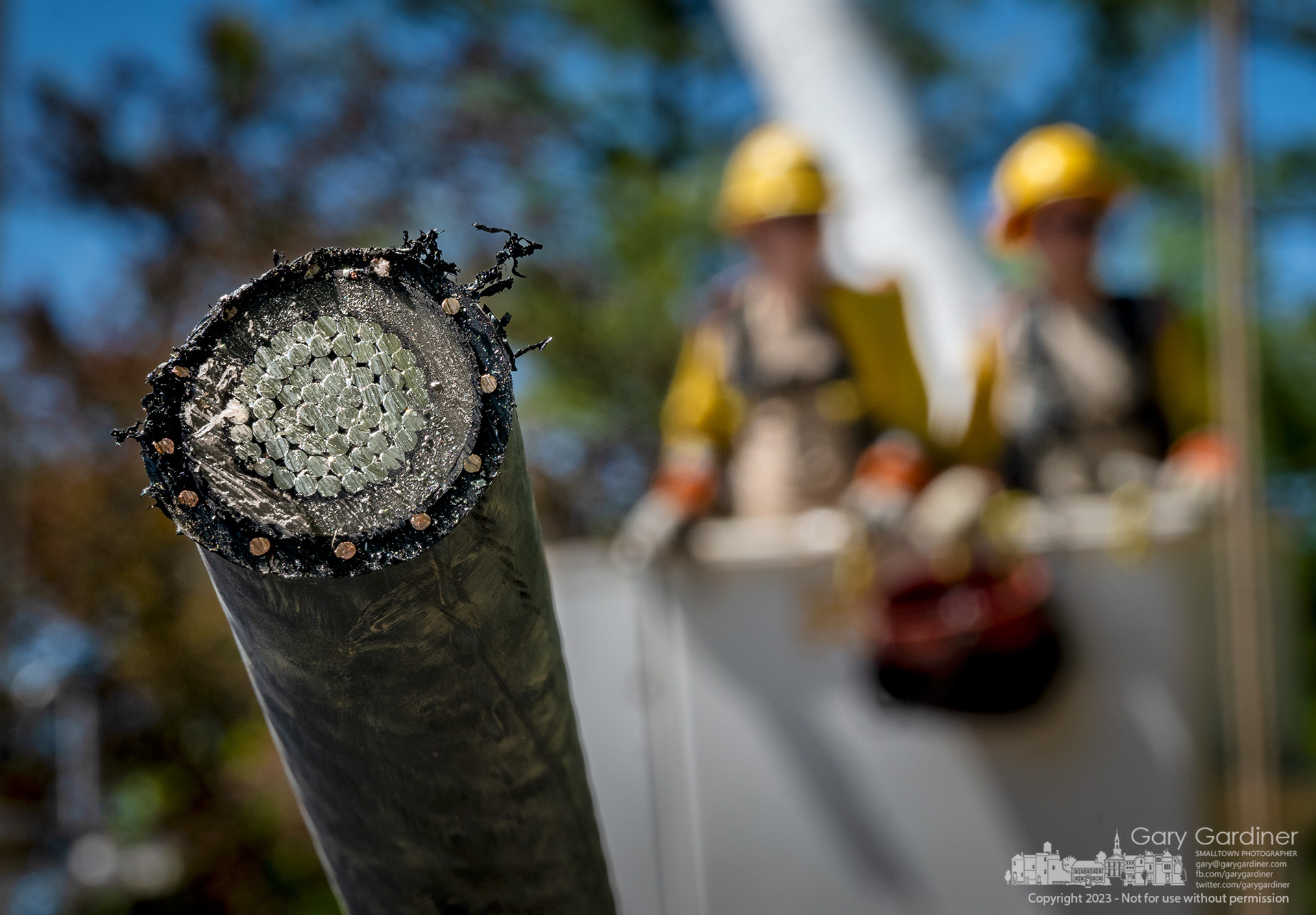 A power line is removed for replacement with newer cabling between AEP transmission lines and the city's underground connection to a distribution center at Spring and Walnut. My Final Photo for May 9, 2023. 