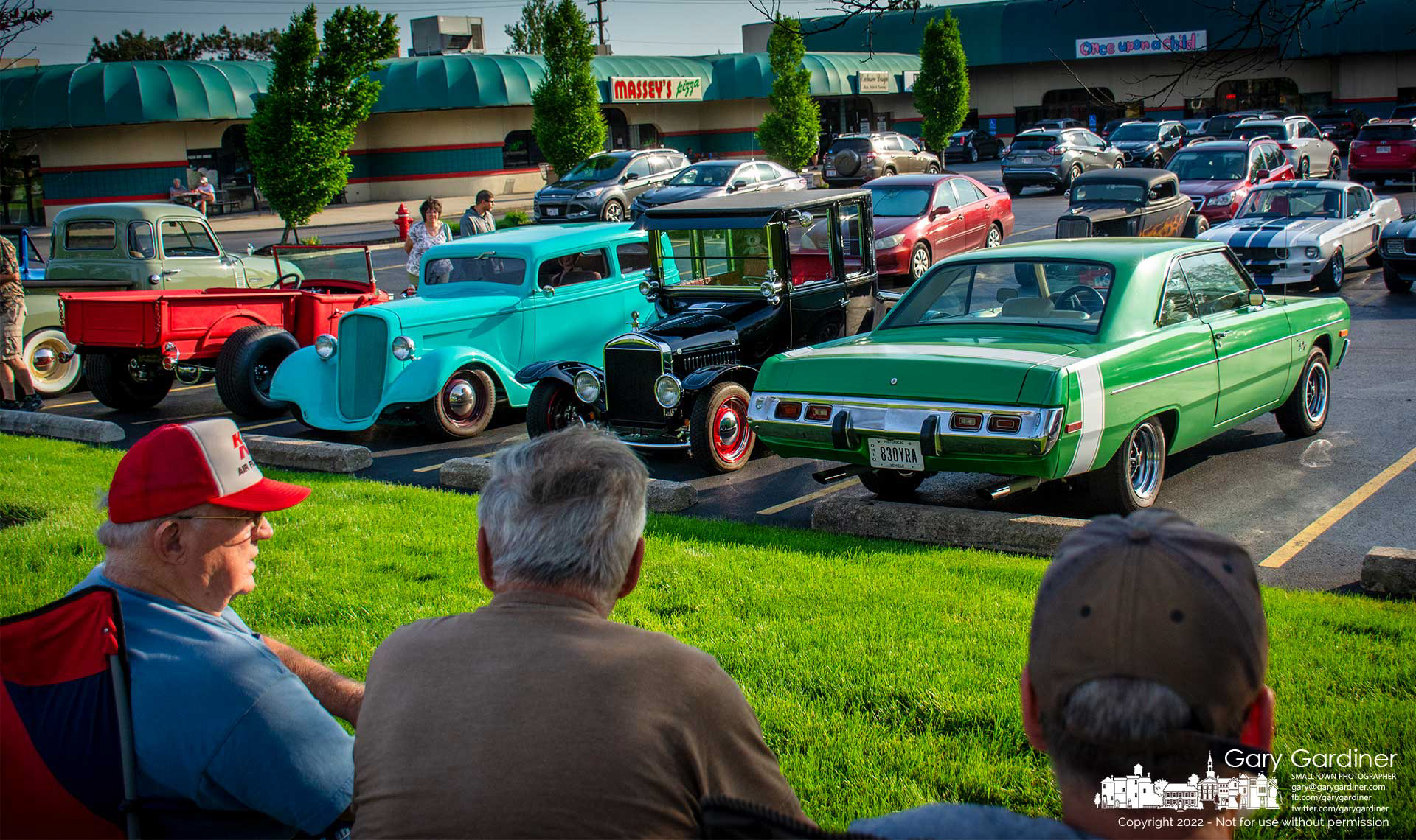 The hot rodders and antique car collectors that once spent their Friday nights at Yoagie's Hoagies have moved up the street to Cherri Park Square where there is more room to talk about their cars. My Final Photo for May 20, 2022.
